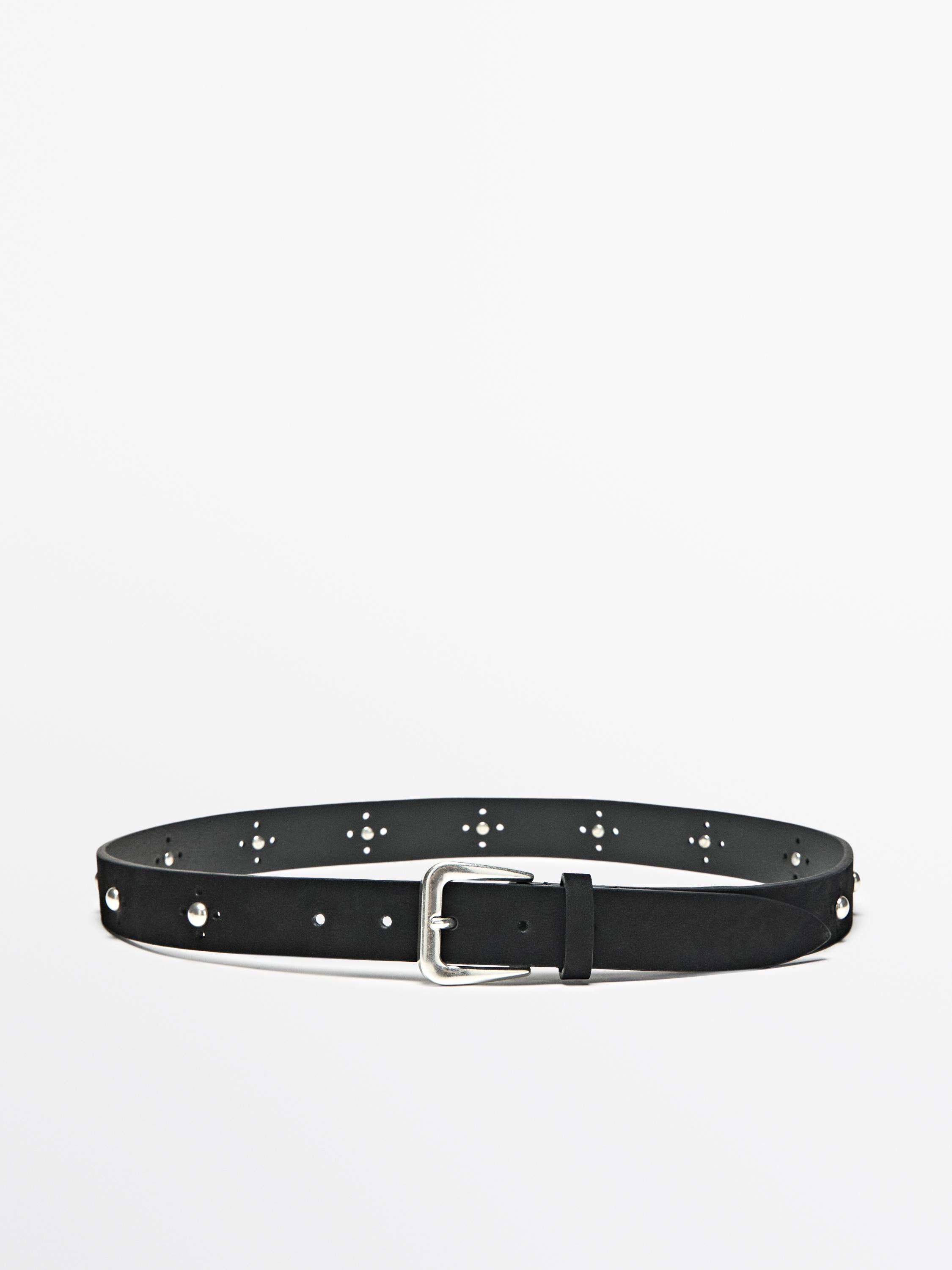 Cinturón troquelado tachas