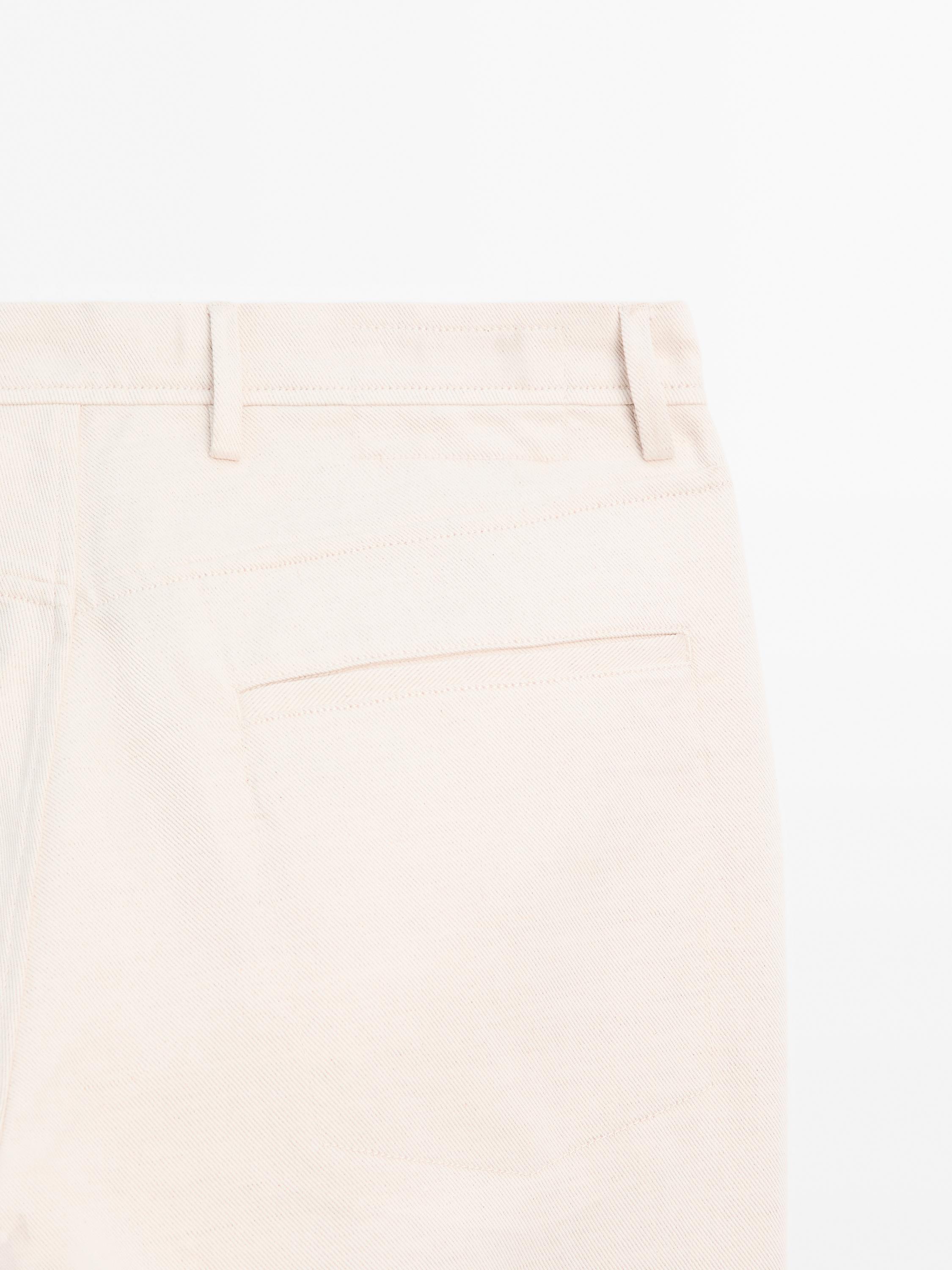 Pantalón tejanero tapered fit mezcla algodón