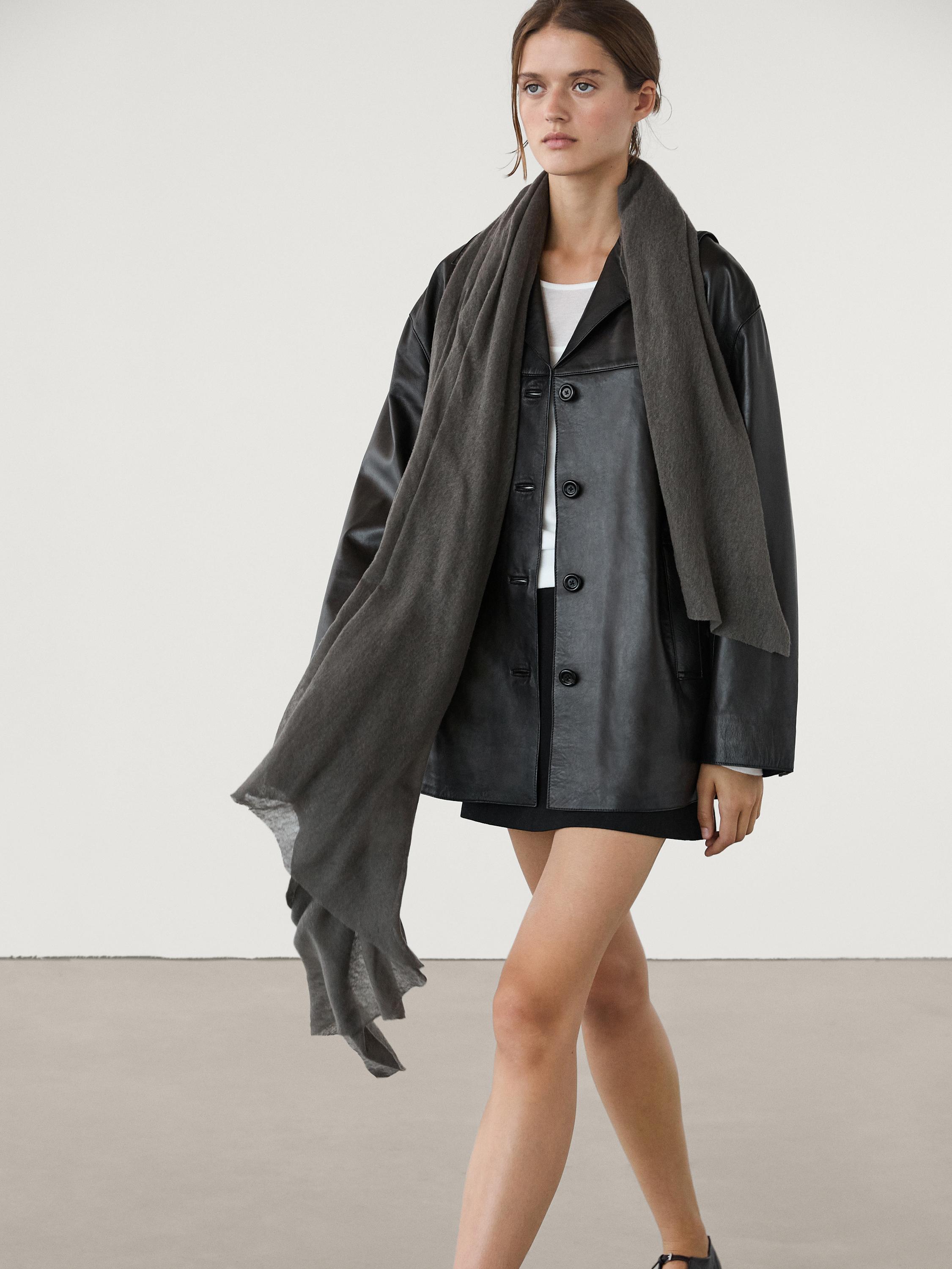 100% cashmere scarf with melange detail