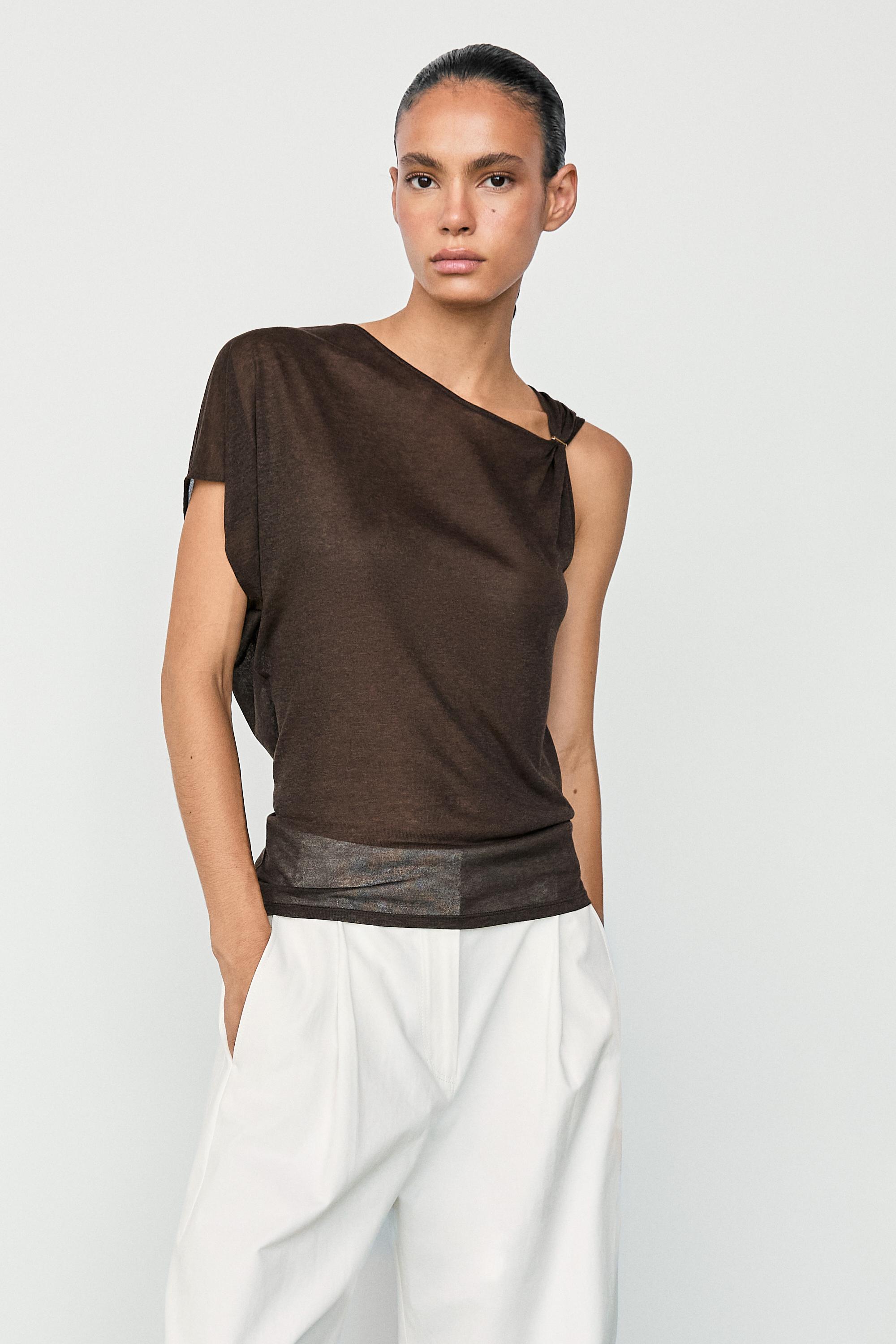 Asymmetric drop sleeve fluid top