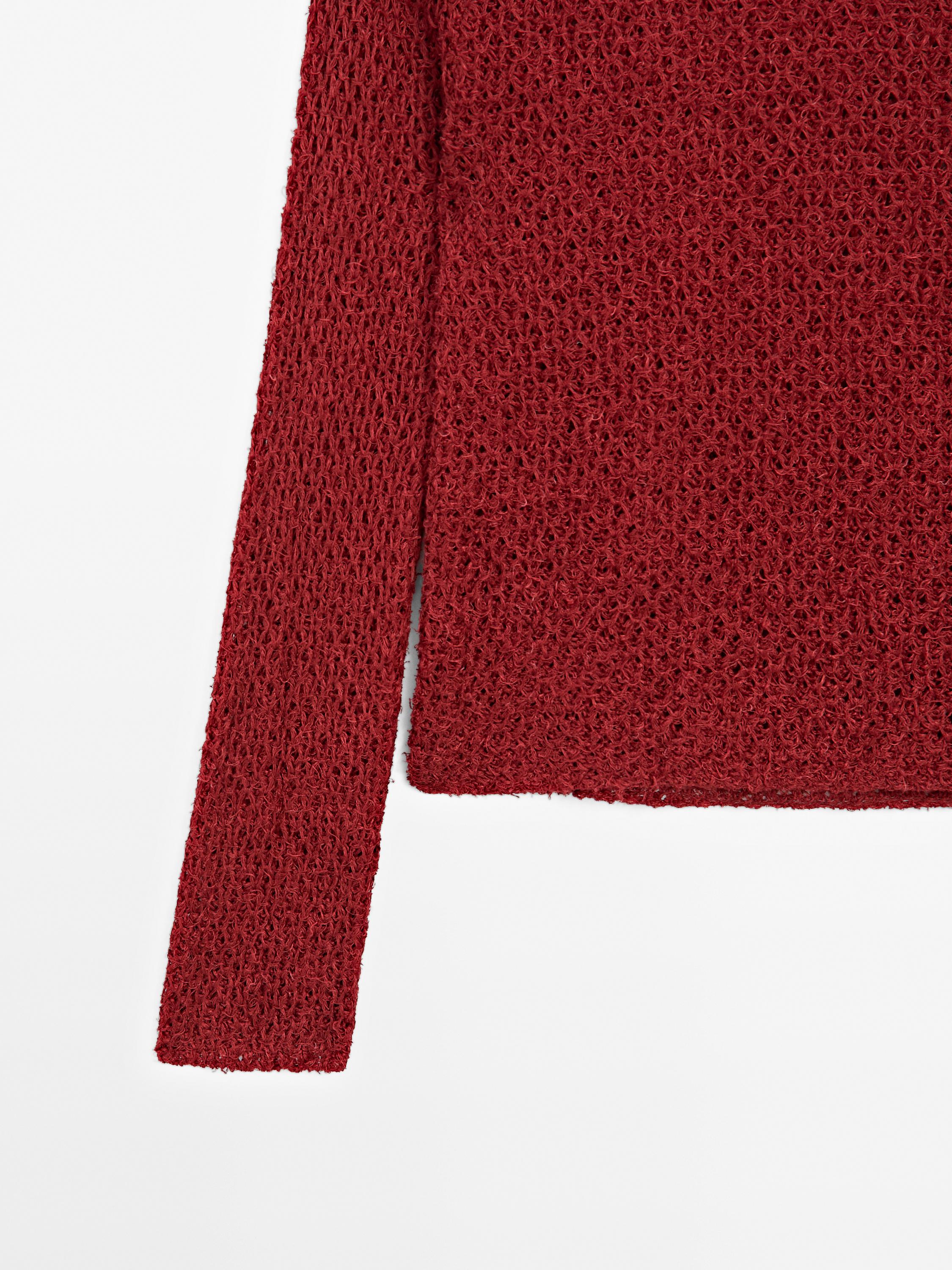 Cutwork sweater with thread detail
