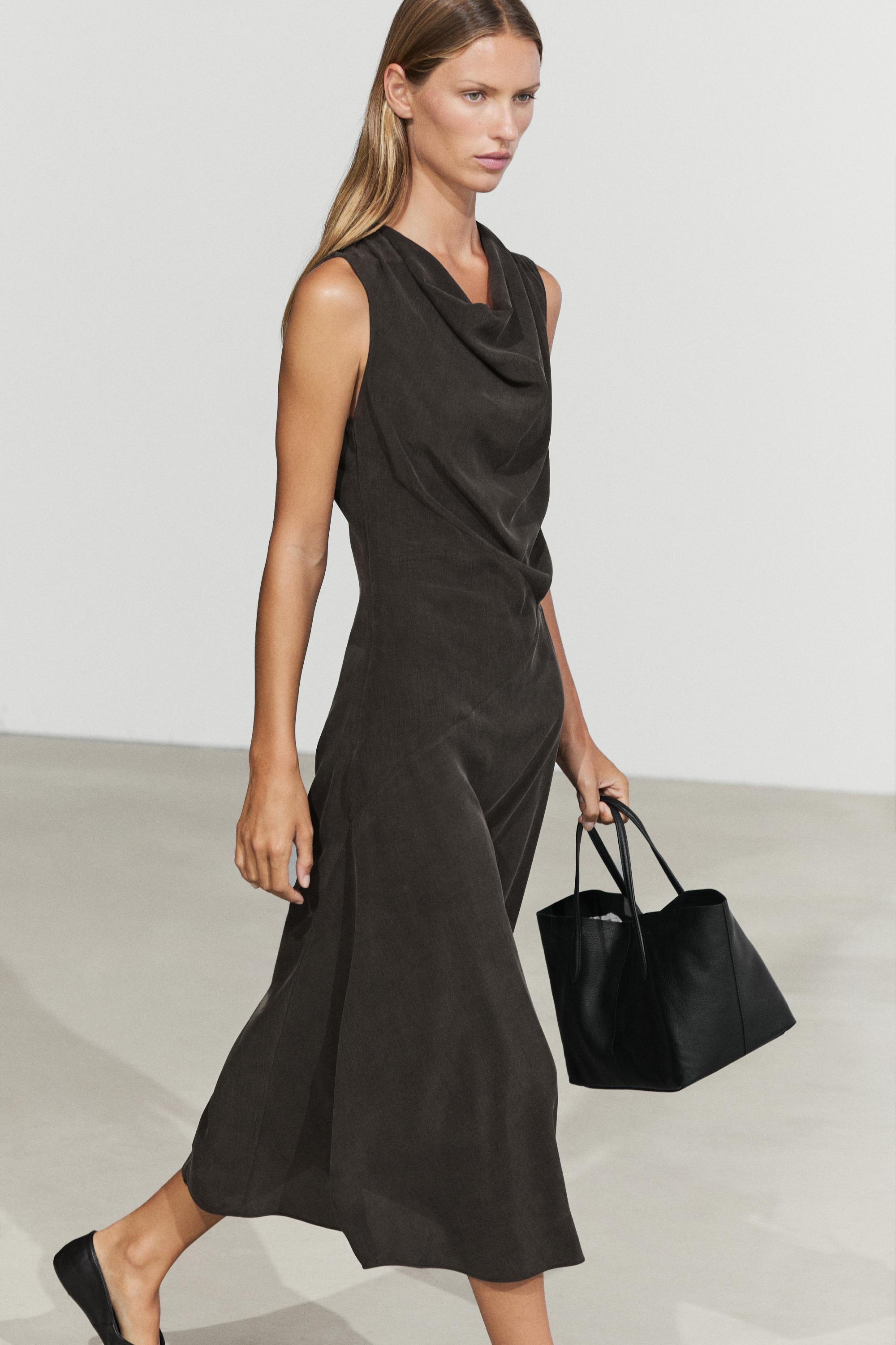 Vestido midi fluido detalle drapeado