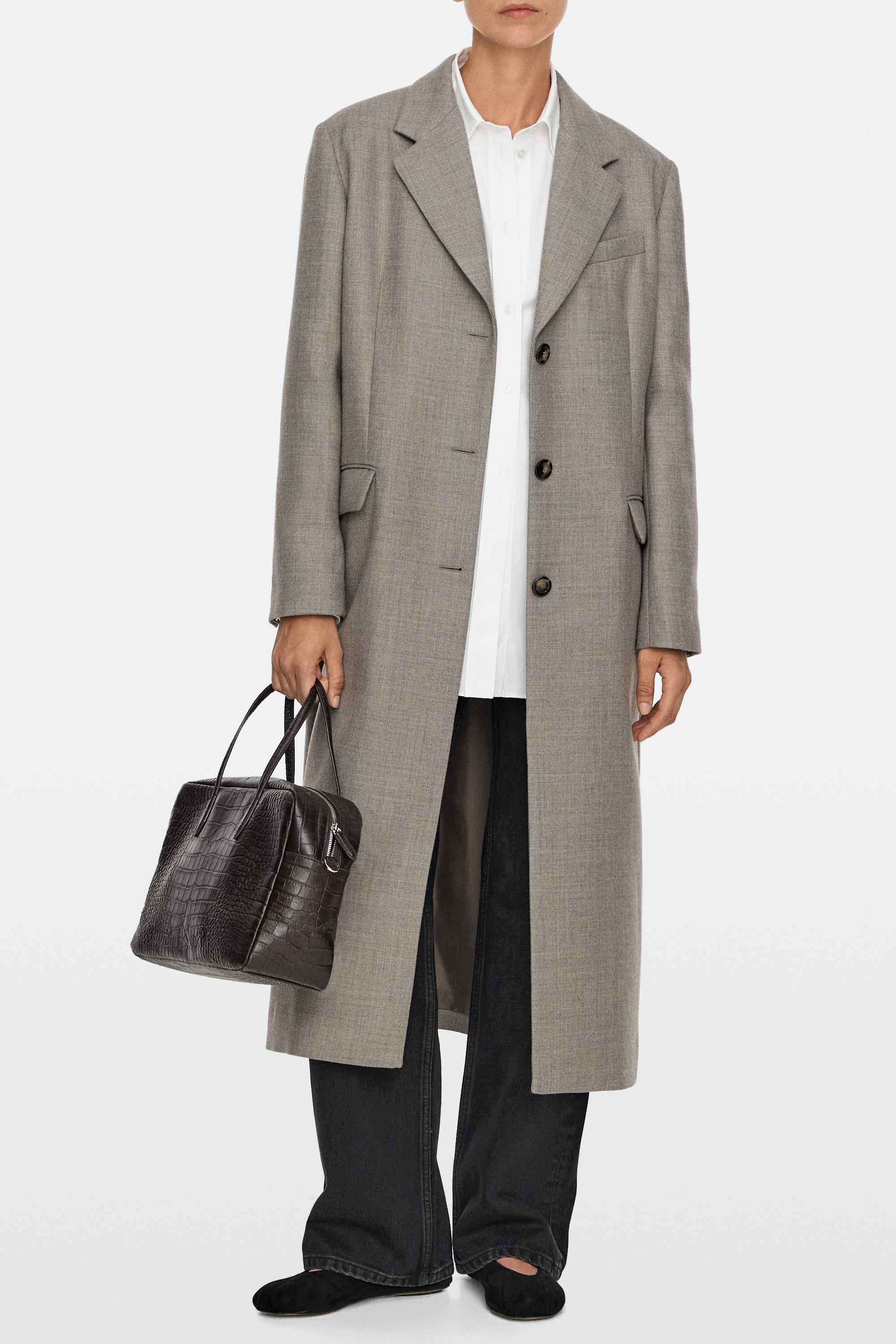 Medium leather textured duffle bag · Brown · Bagsâ Andâ Backpacks
