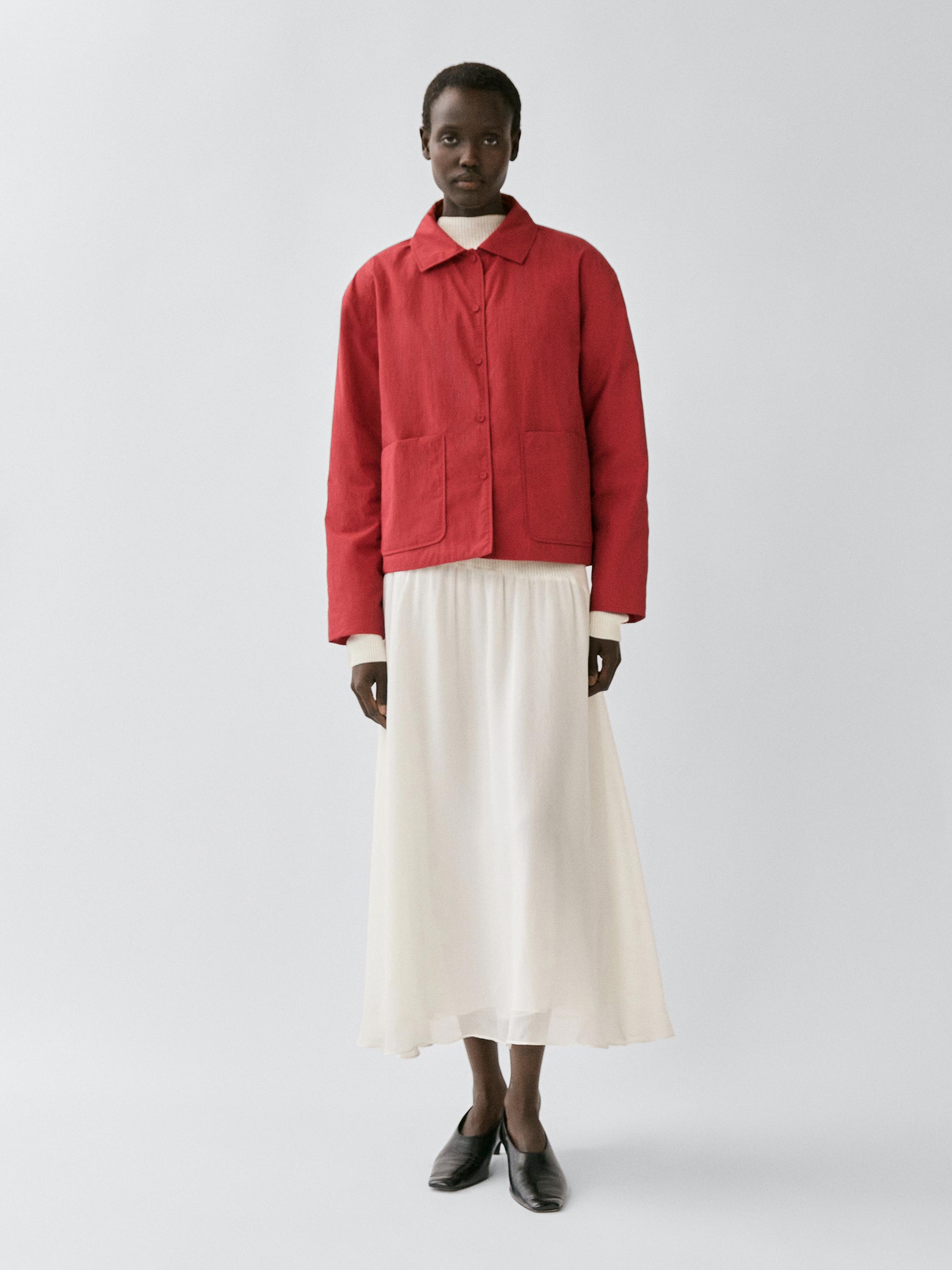 Short padded jacket with pockets