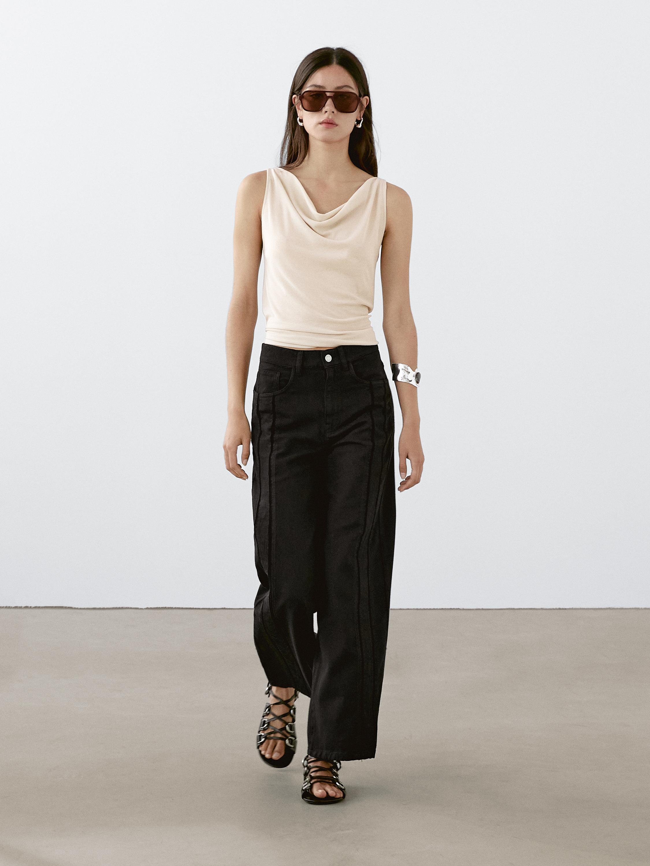 Jeans wide leg high rise cutout detail