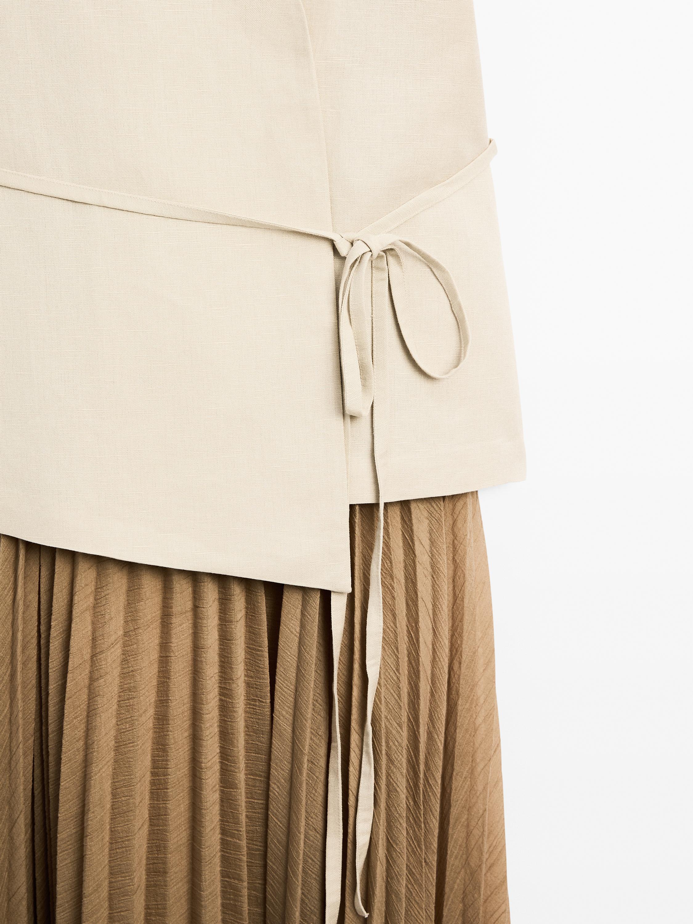 Long pleated dress with waistcoat detail