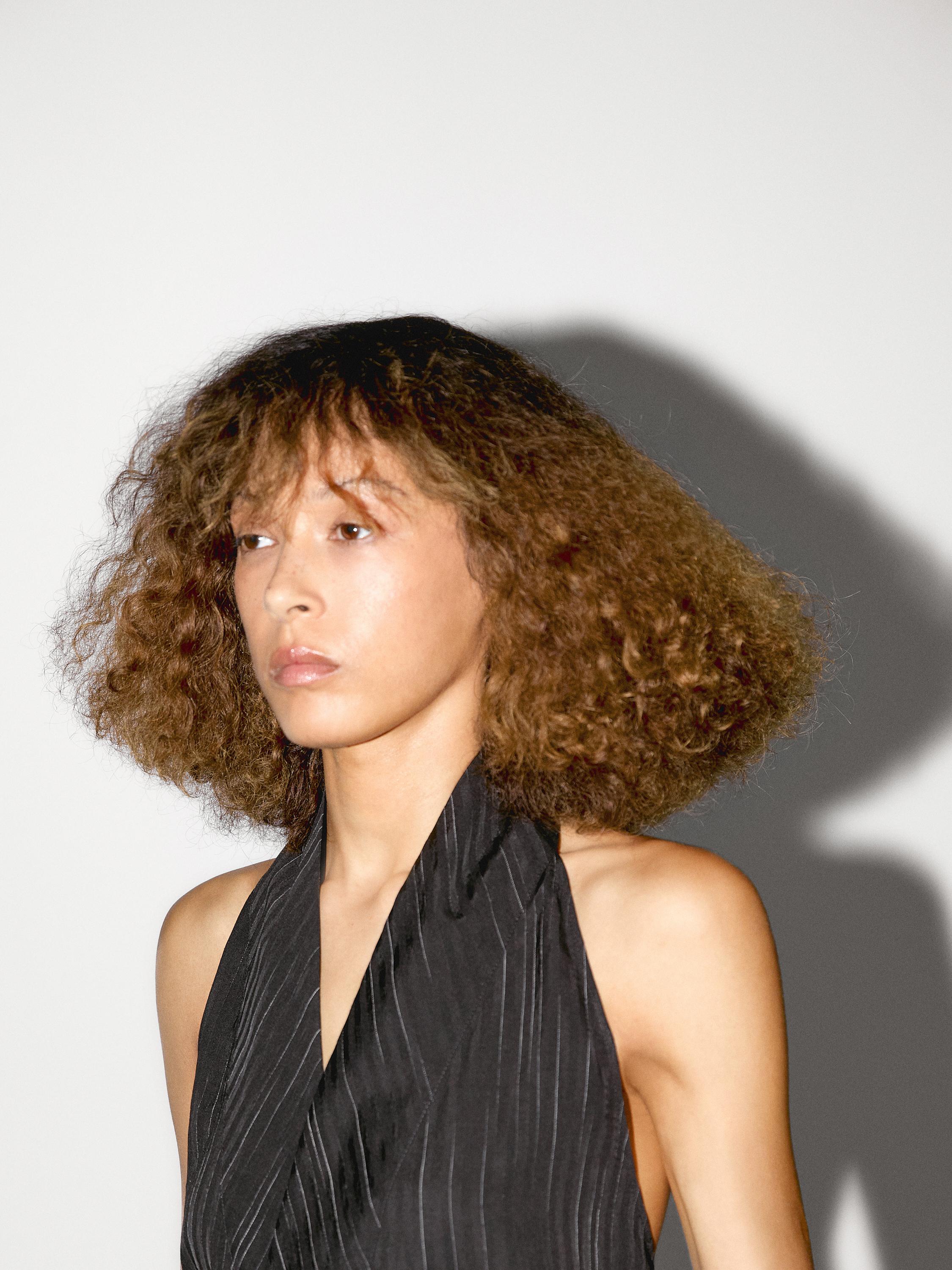 Haltertopp med randig detalj