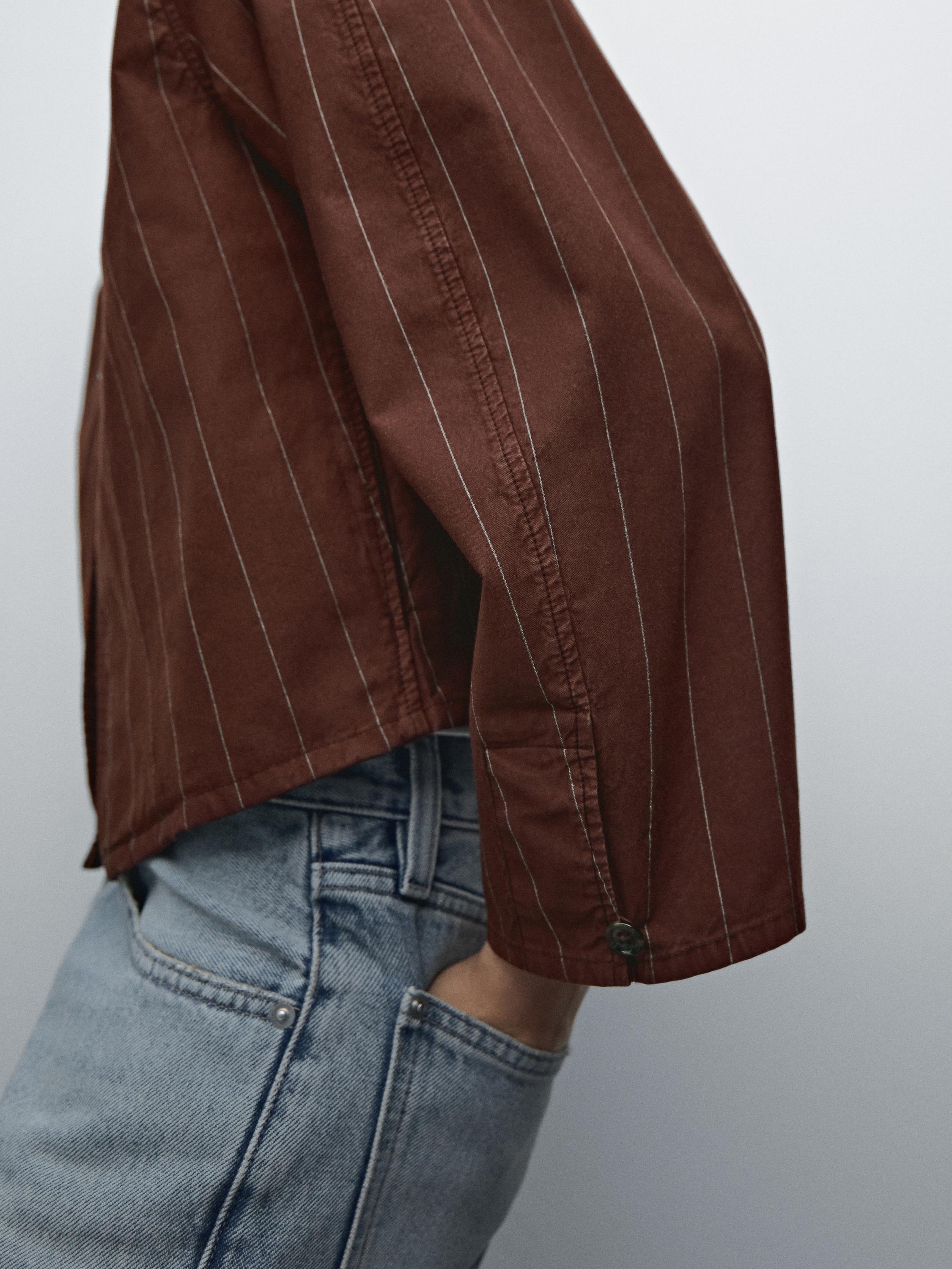 Striped jacket with button detail