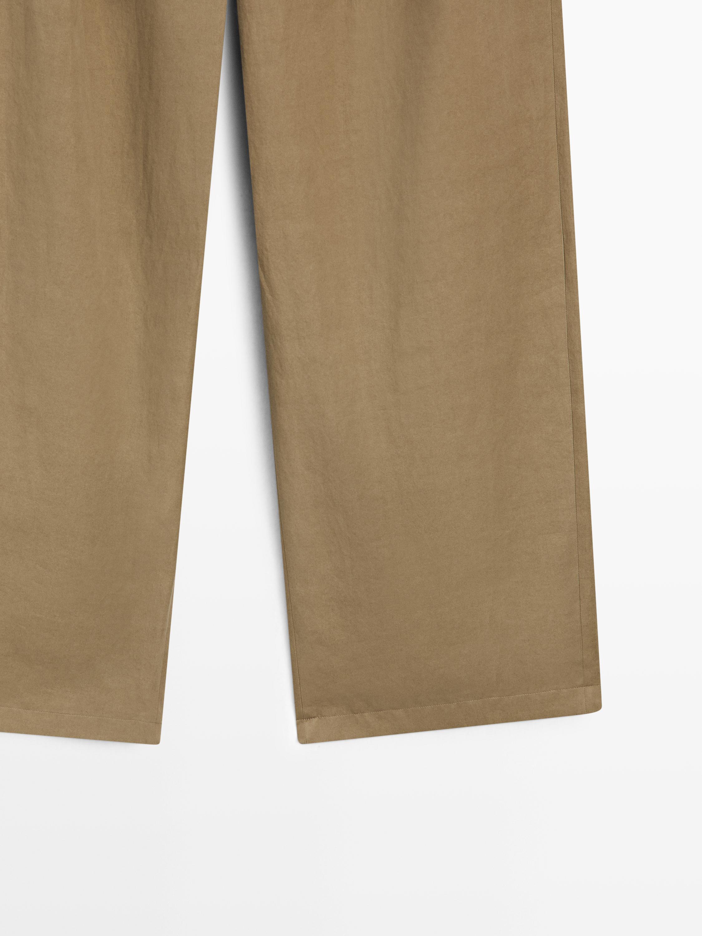 Pleated pants with crossover fastening detail - STUDIO — KHAKI
