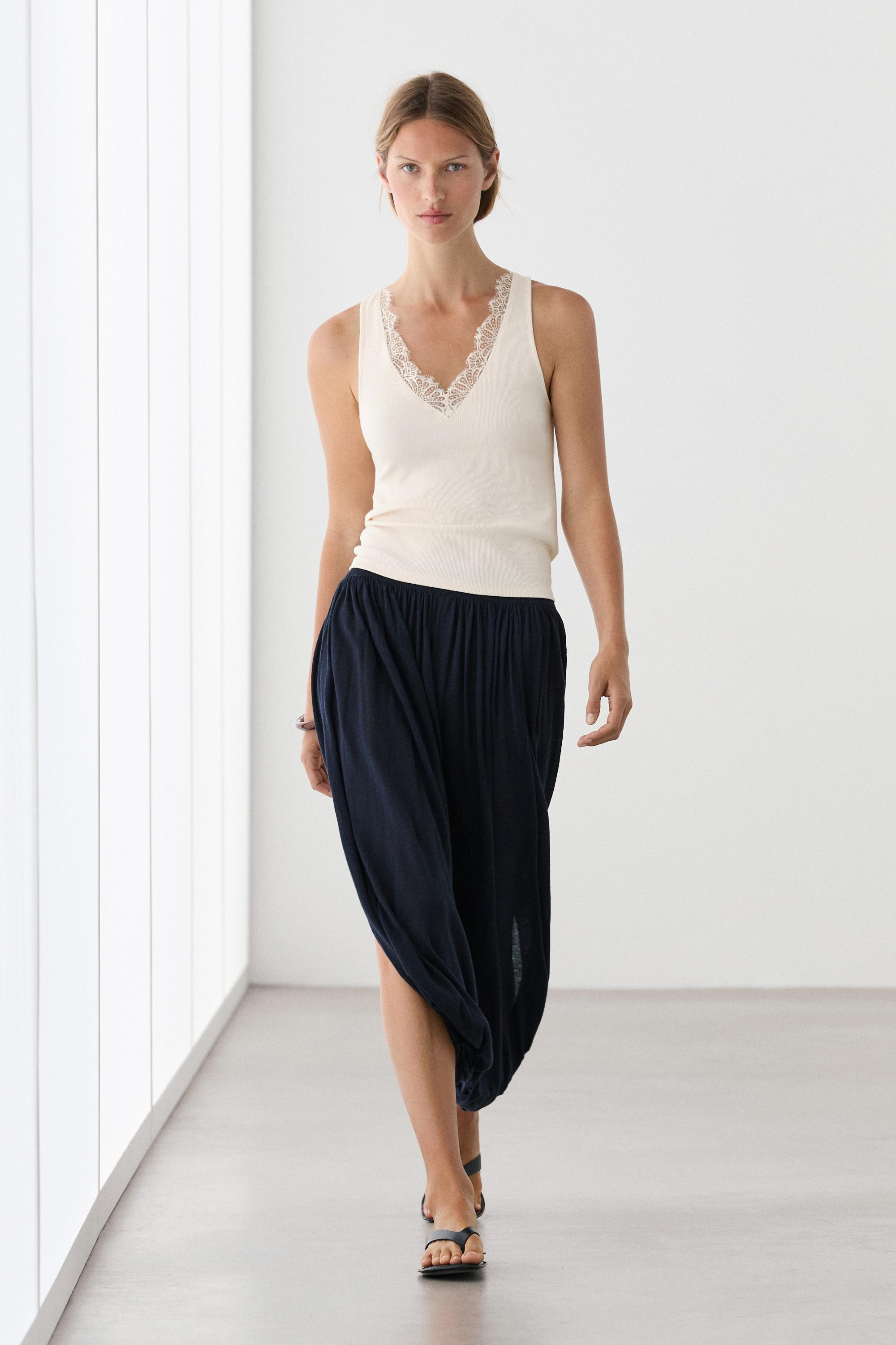 V-neck top with lace detail — CREAM