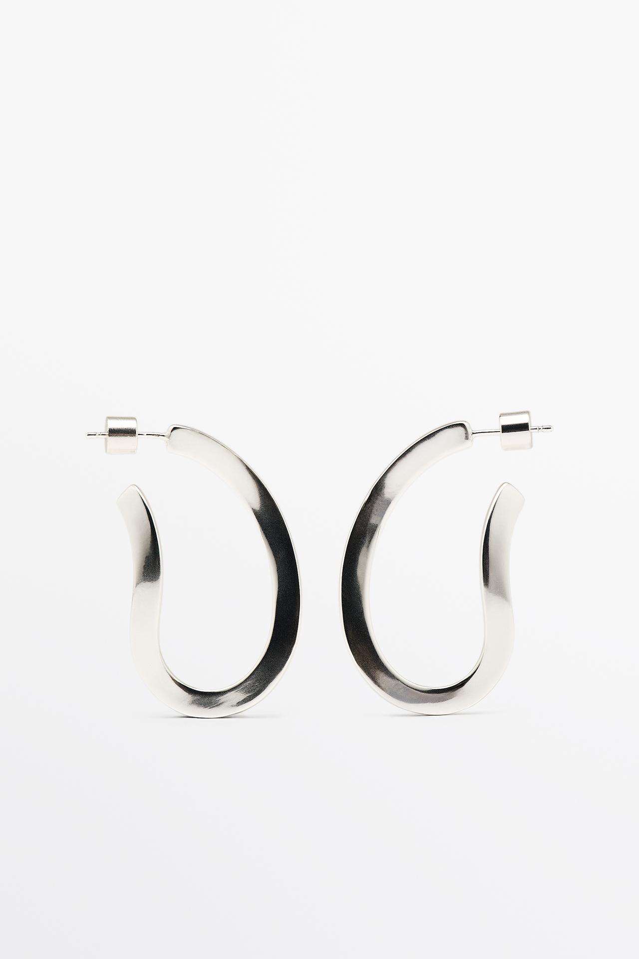 Twisted oval hoop earrings — SILVER