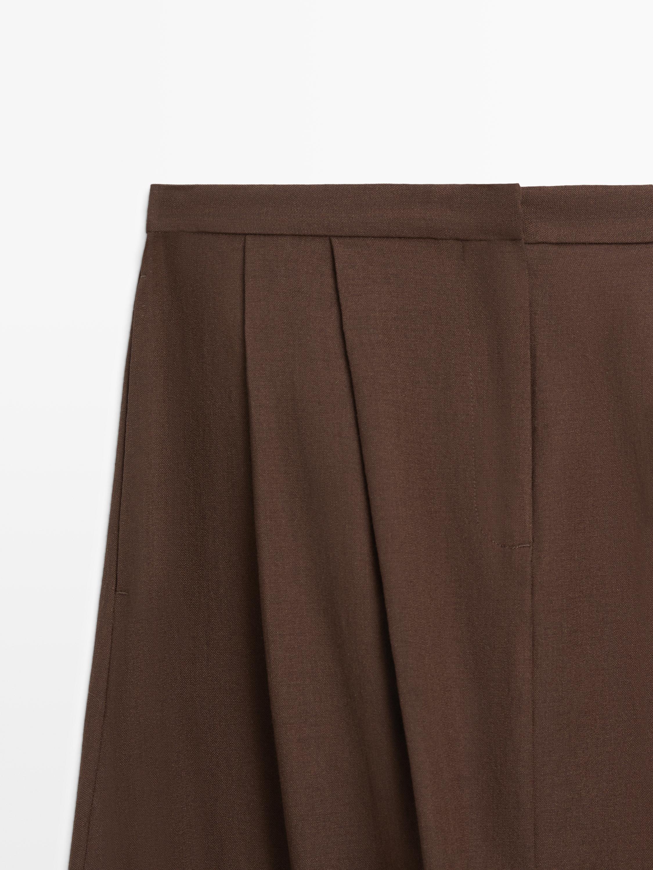 Baggy trousers with pleated details — BROWN