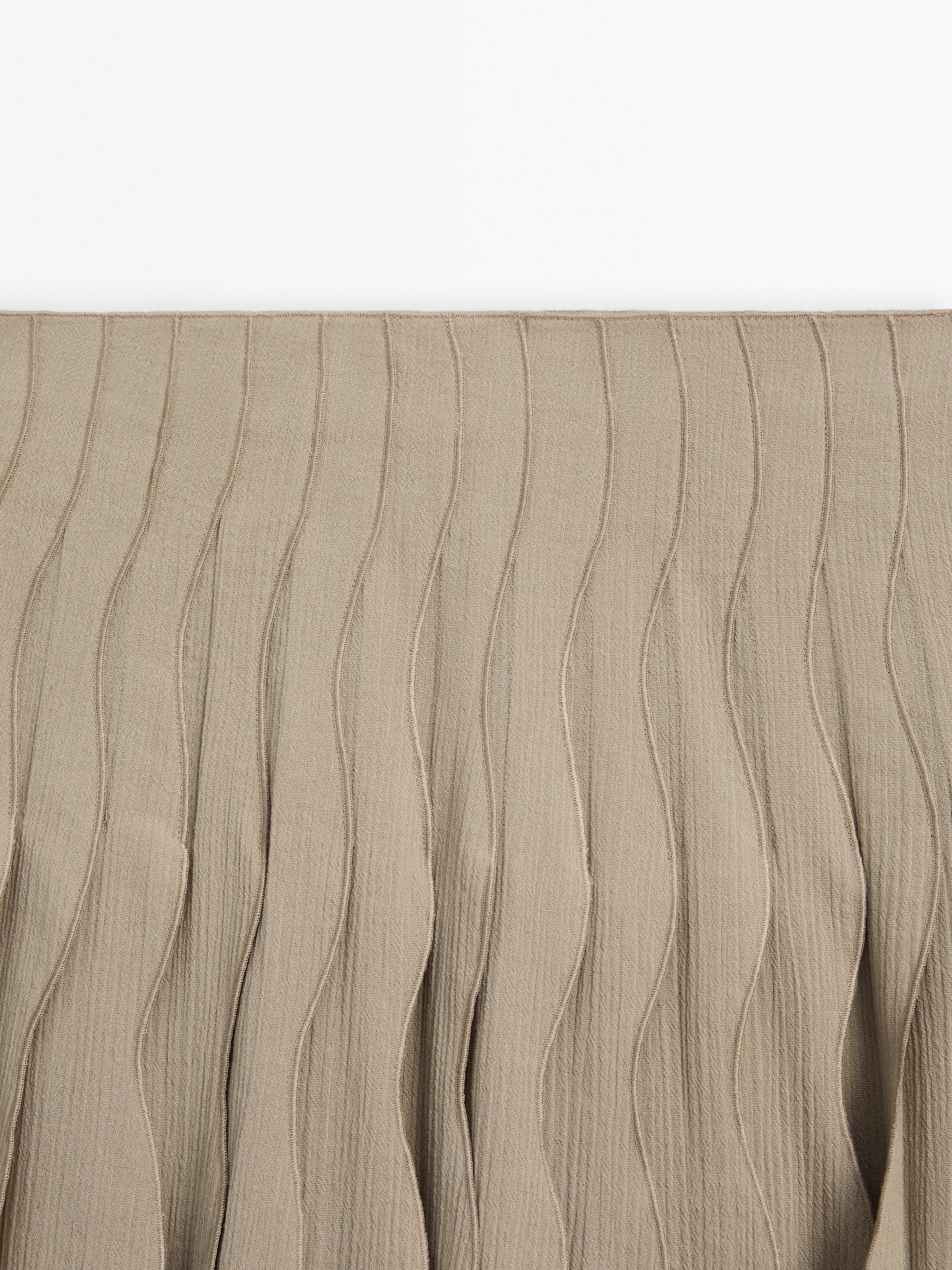 Wavy pleated midi skirt