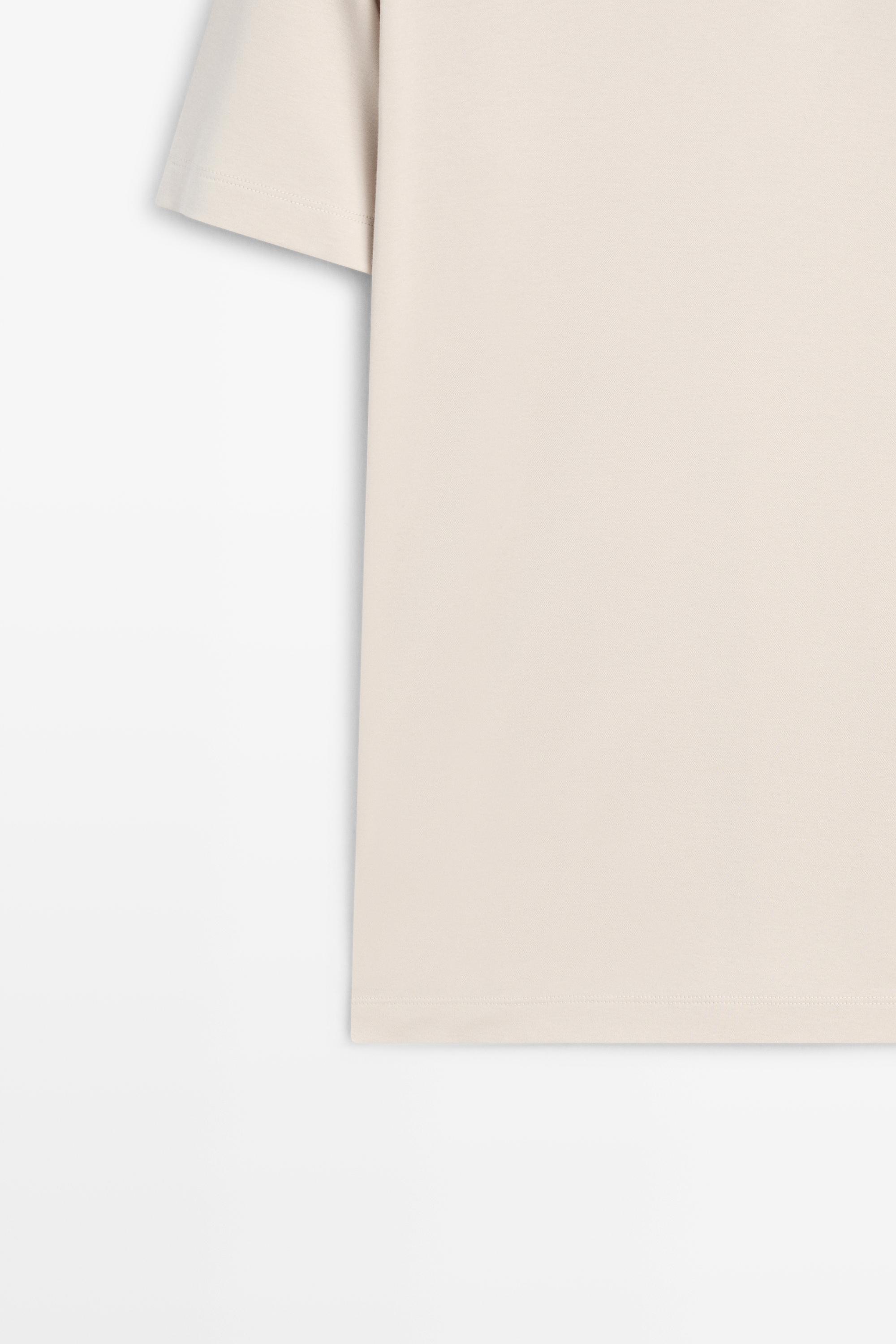 100% cotton V-neck knit polo — STONE