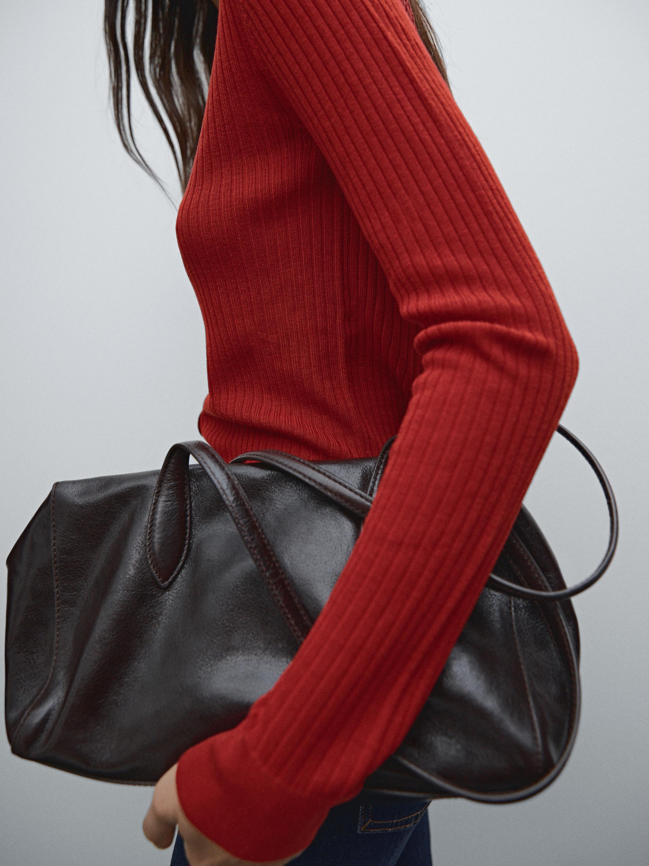 Ribbed knit sweater with polo collar and buttons