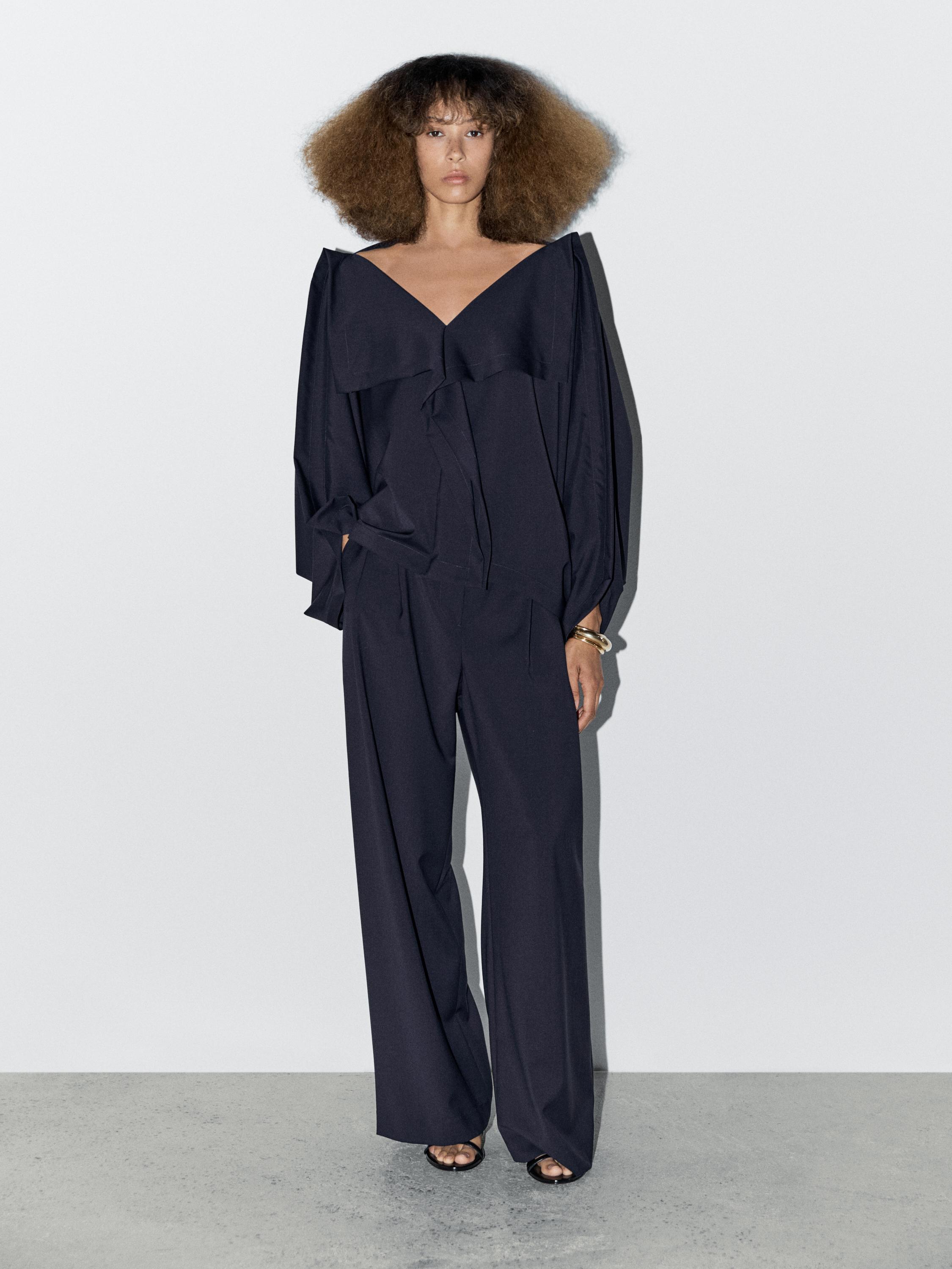 Voluminous V-neck blouse - STUDIO