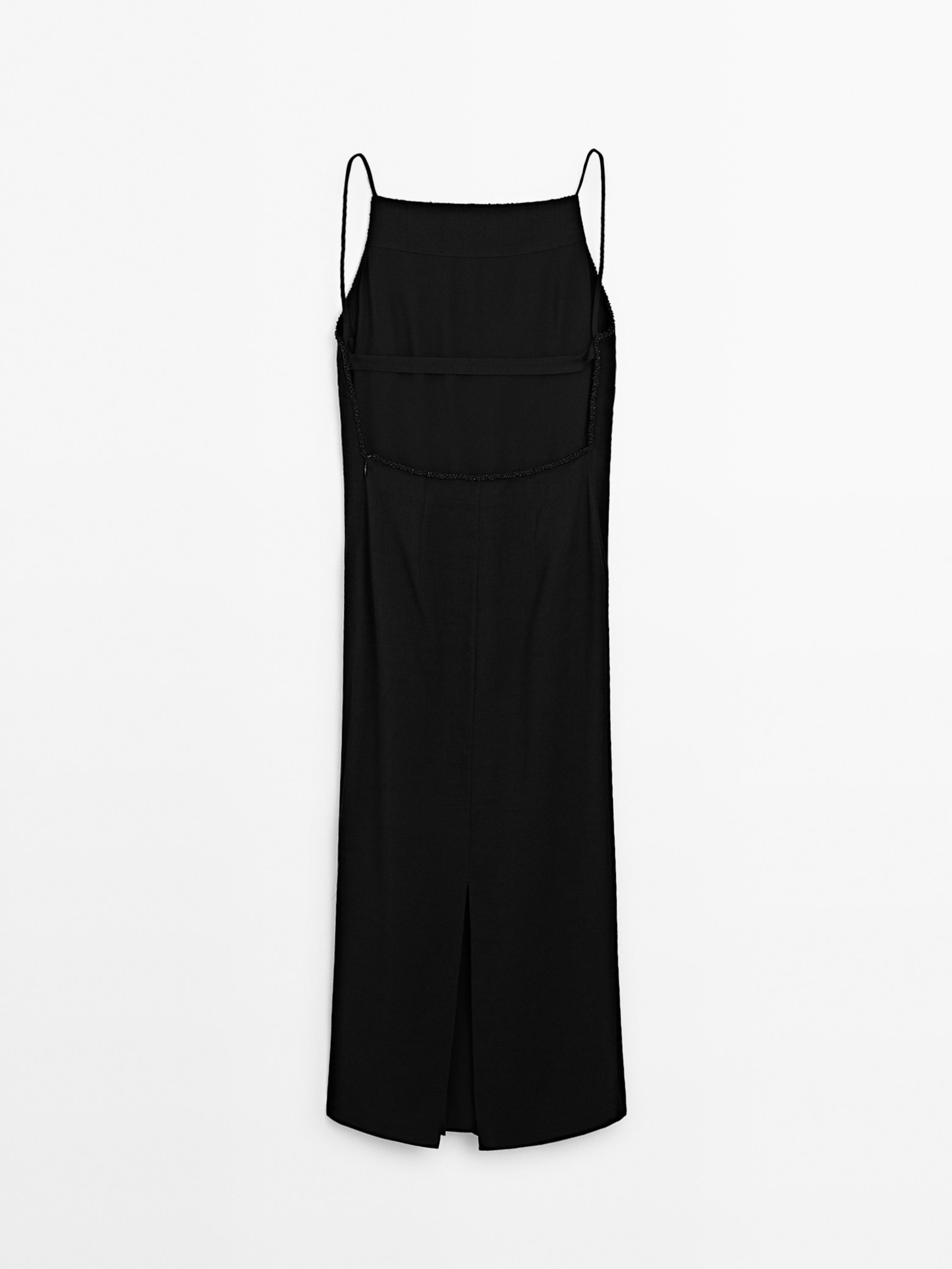 Long dress with rhinestone detail