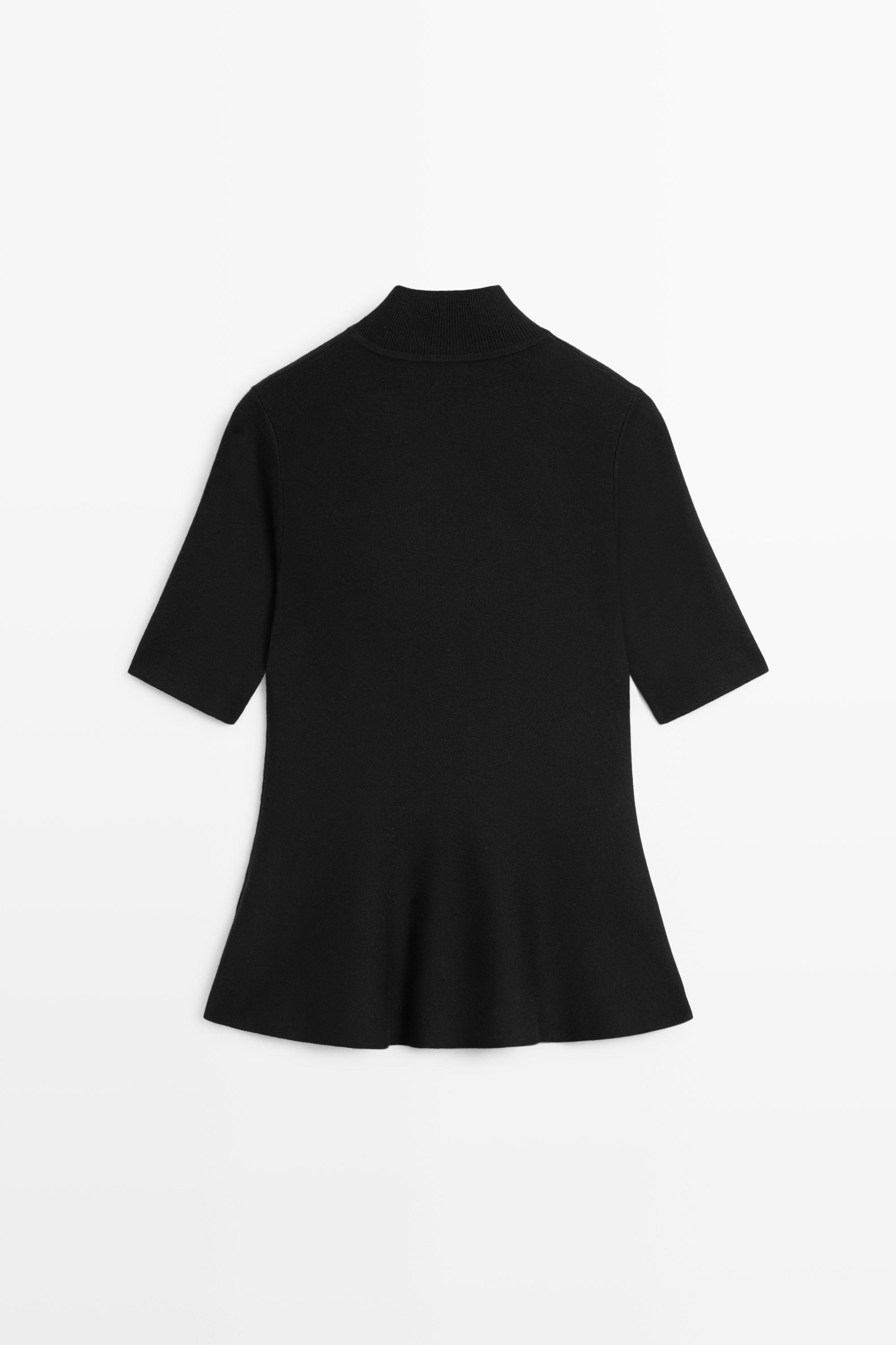 Peplum detail knit top — BLACK