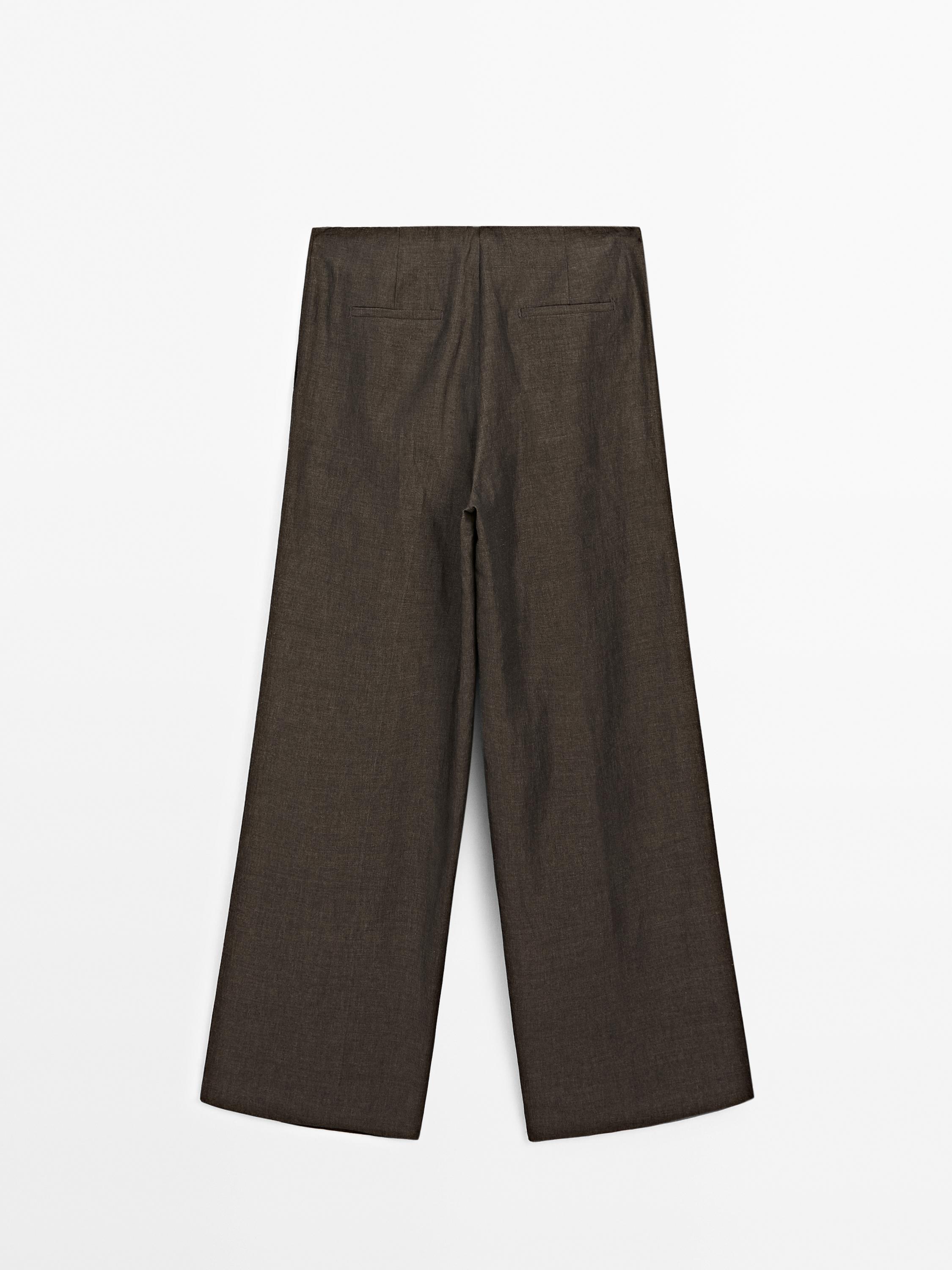 Flowing linen blend trousers with pleats