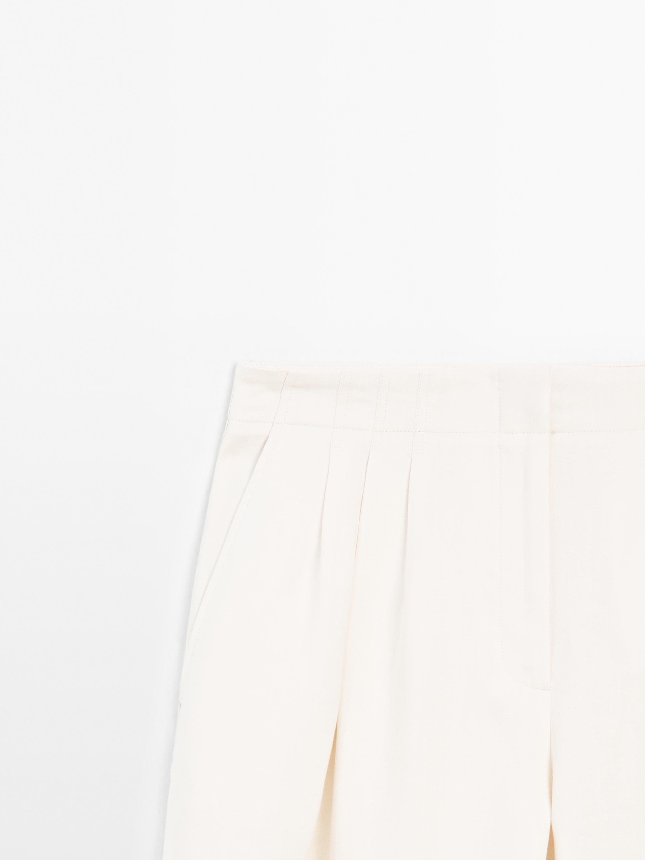 Suit trousers in contrasting fabric