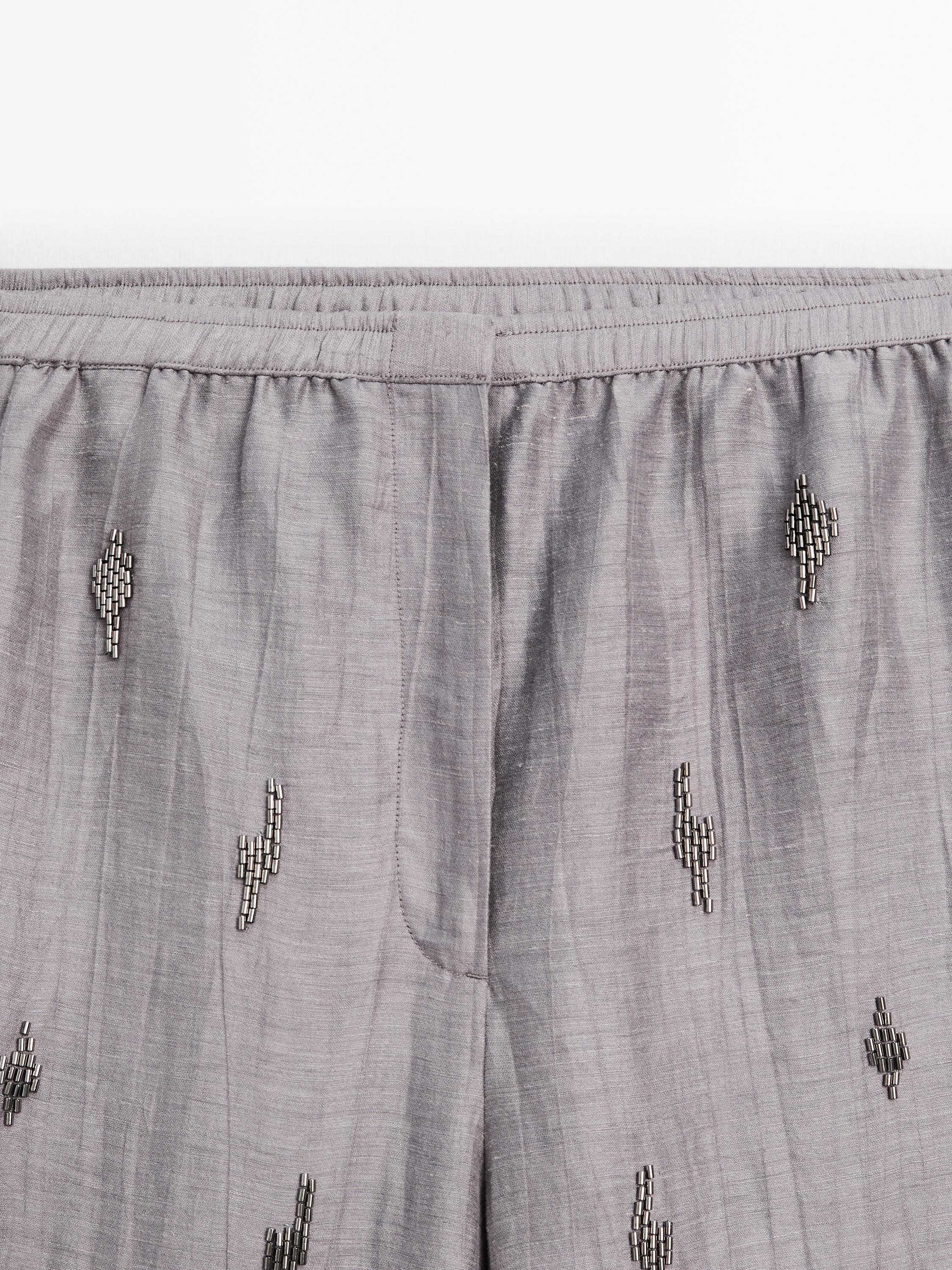Linen blend trousers with rhinestone detail