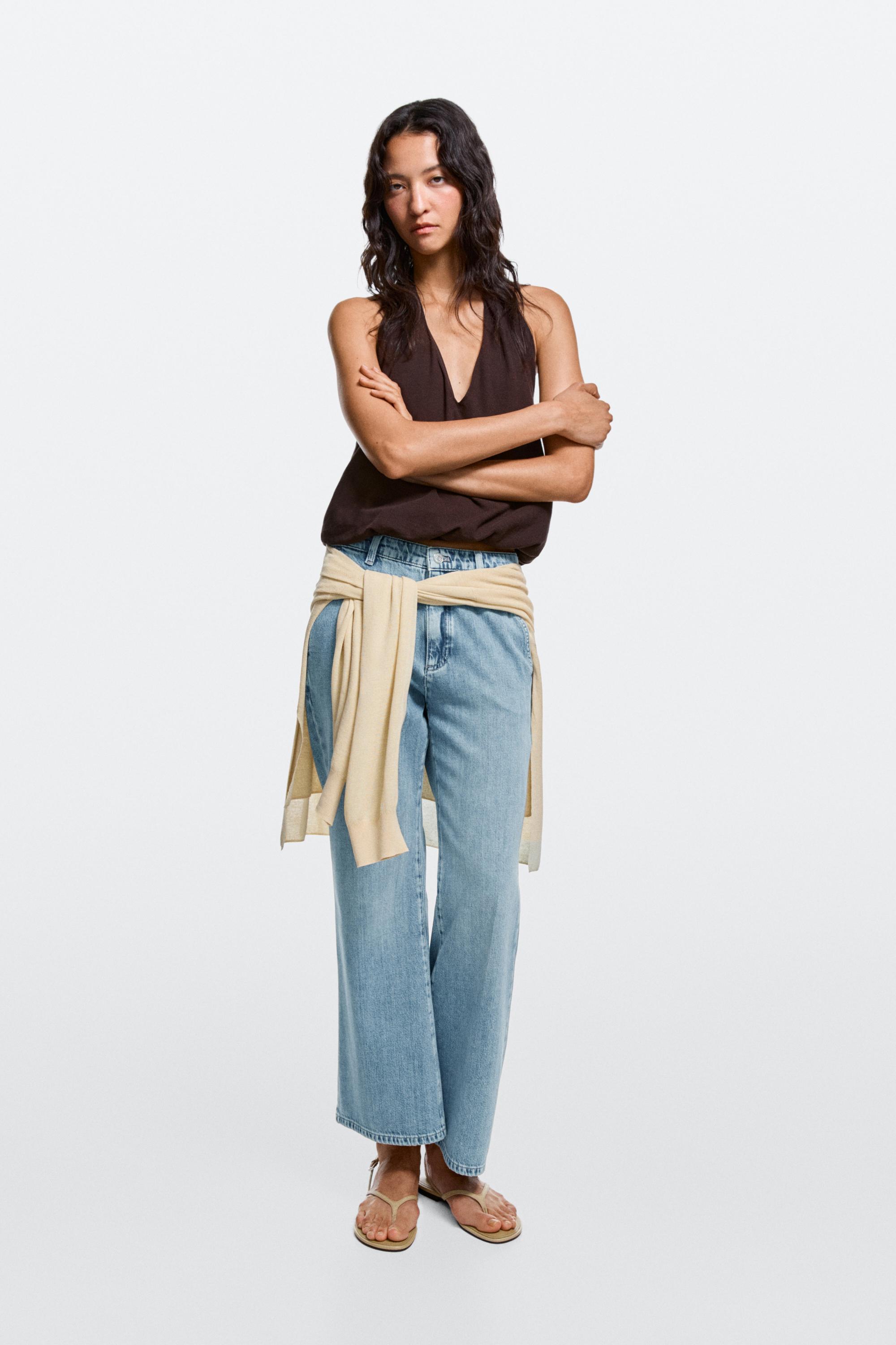 Jeans flare fit cropped tiro alto