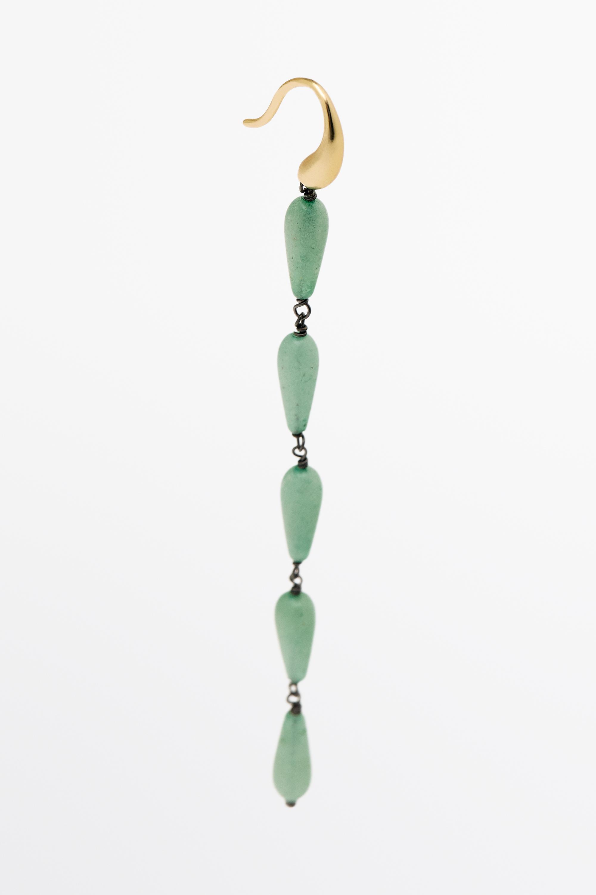 Boucles d’oreilles pendantes ornées de gemmes
