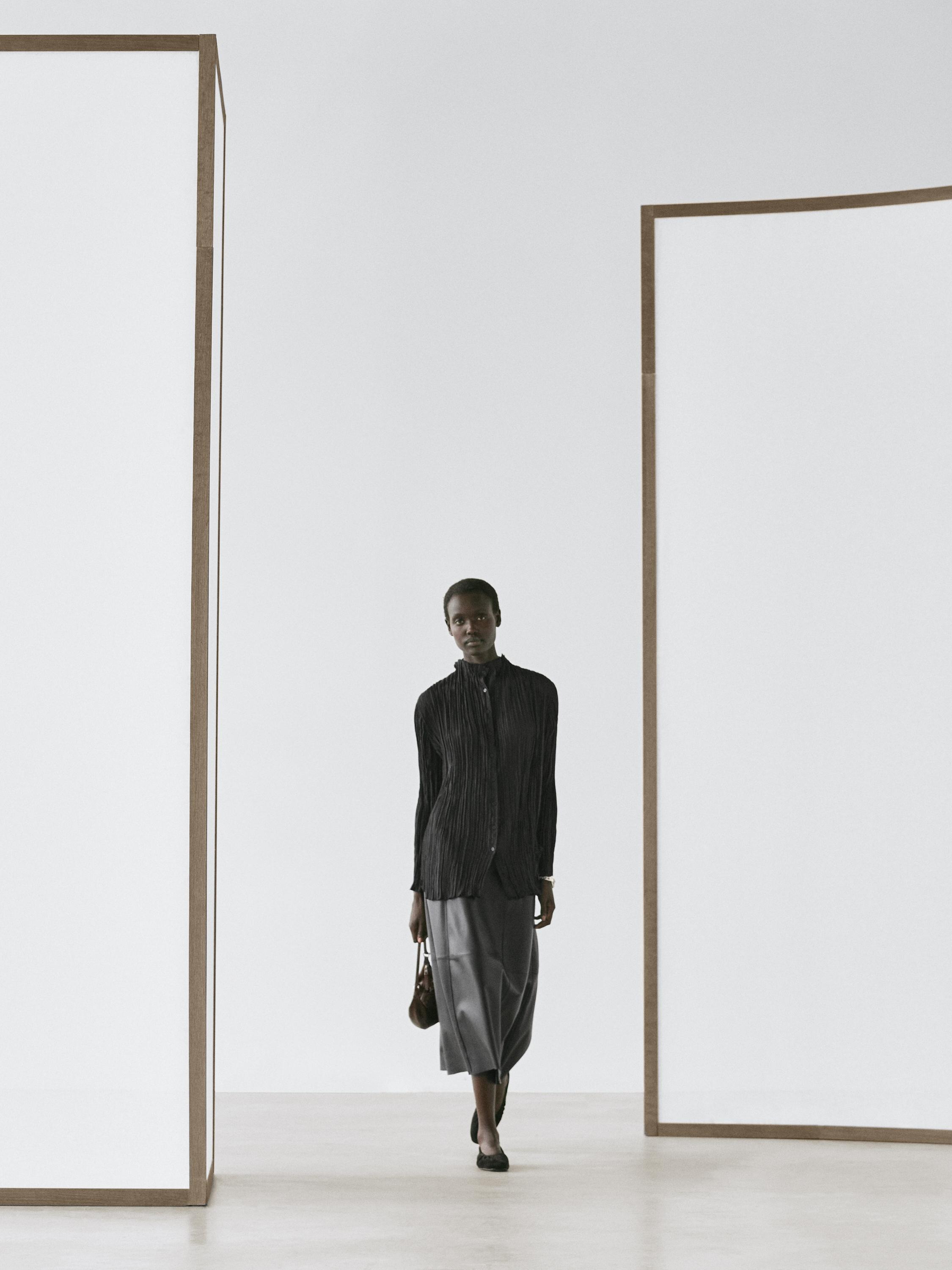 Flowing shirt with pleated detail