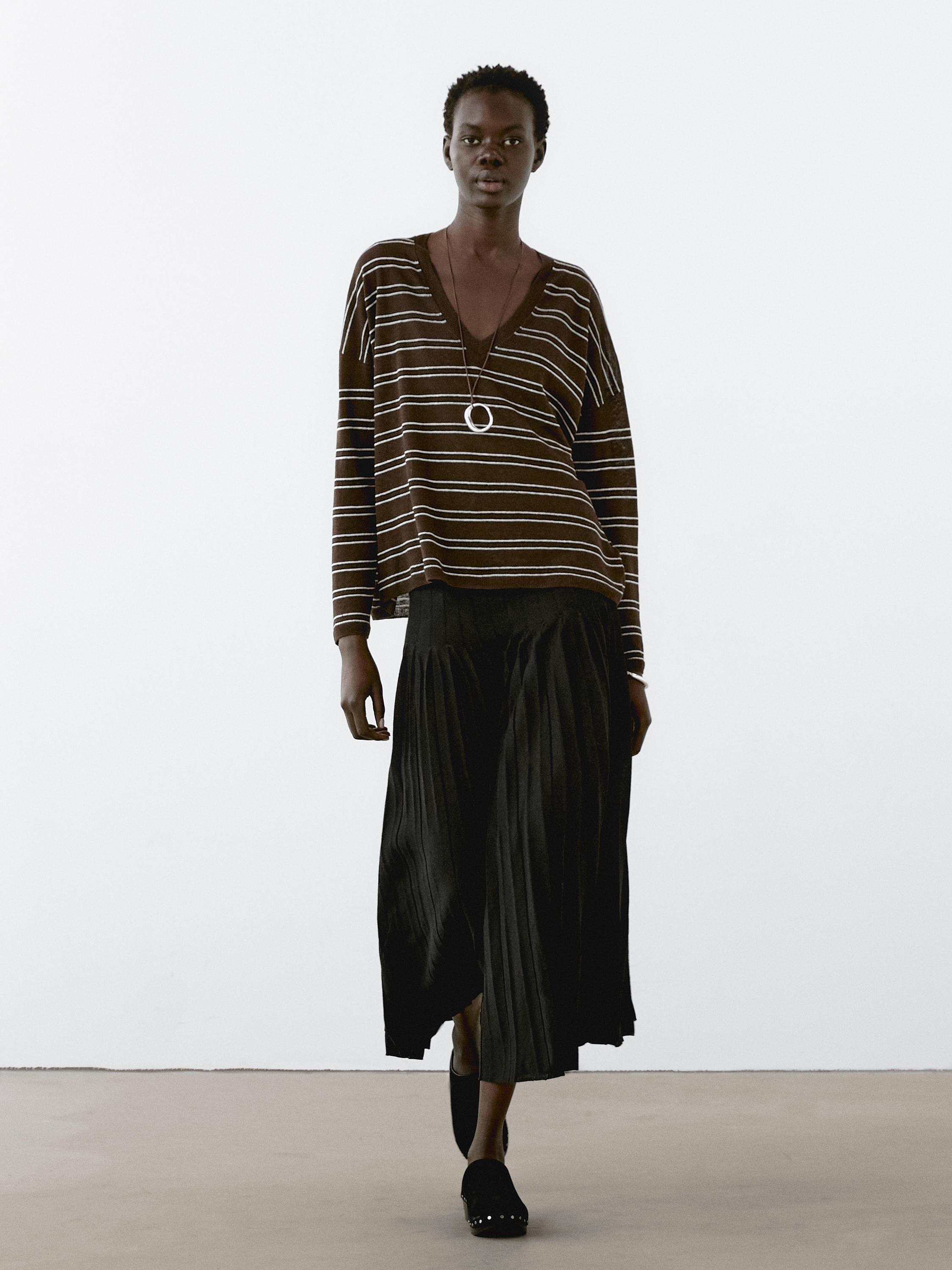 سويتر محاك مخطط كتان 100%