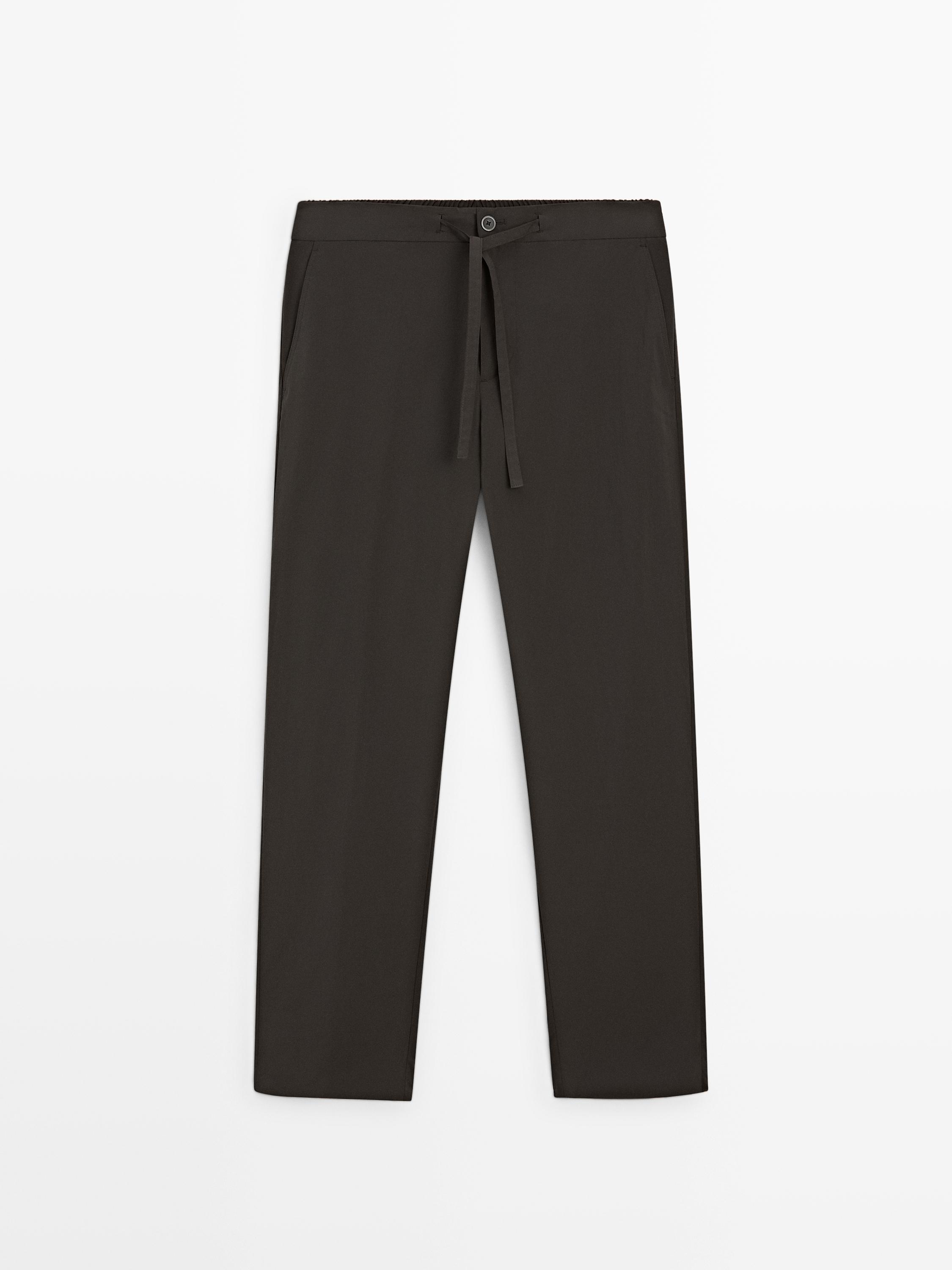 Total look technical trousers