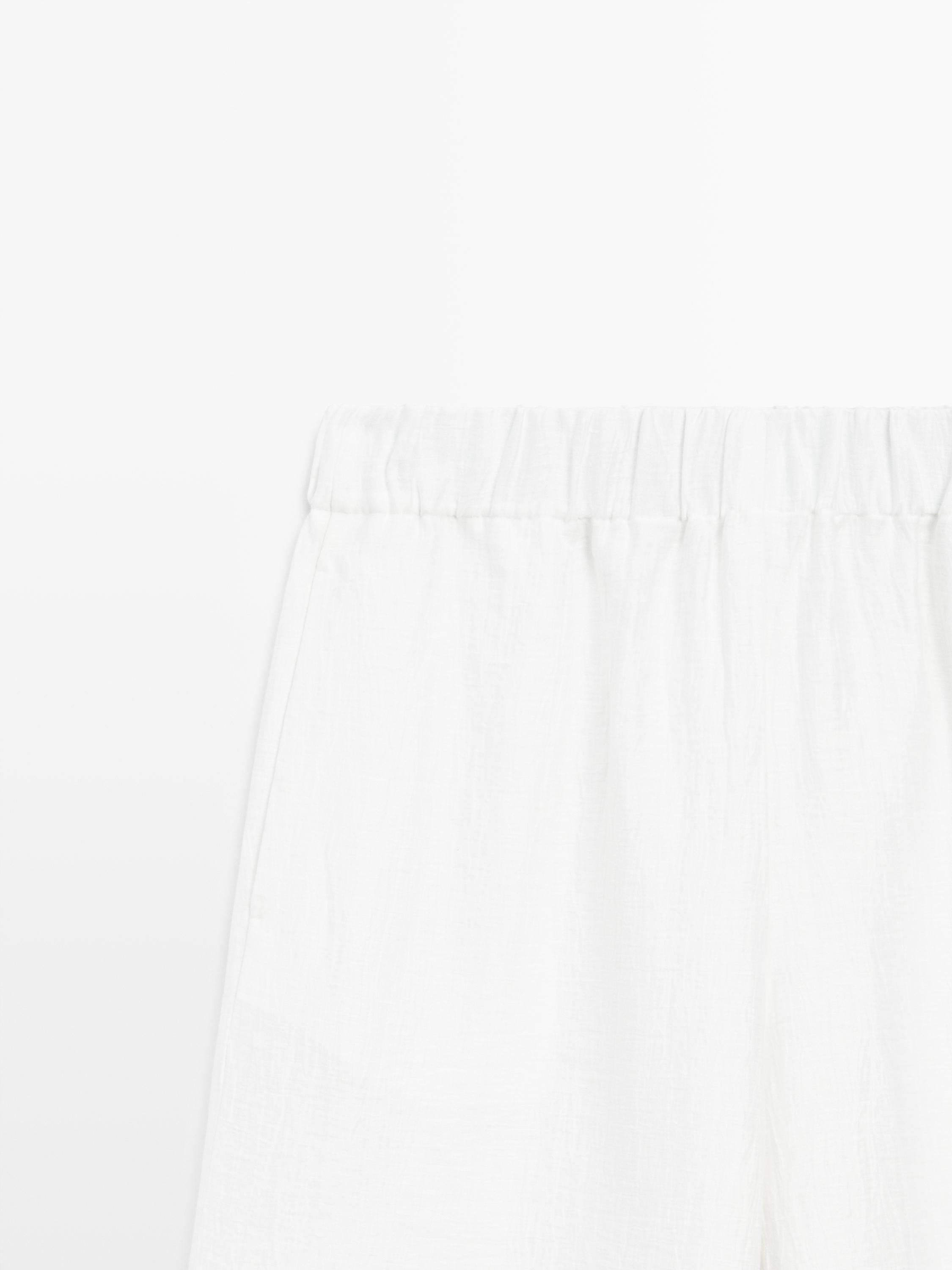Flowing trousers with piping detail — WHITE