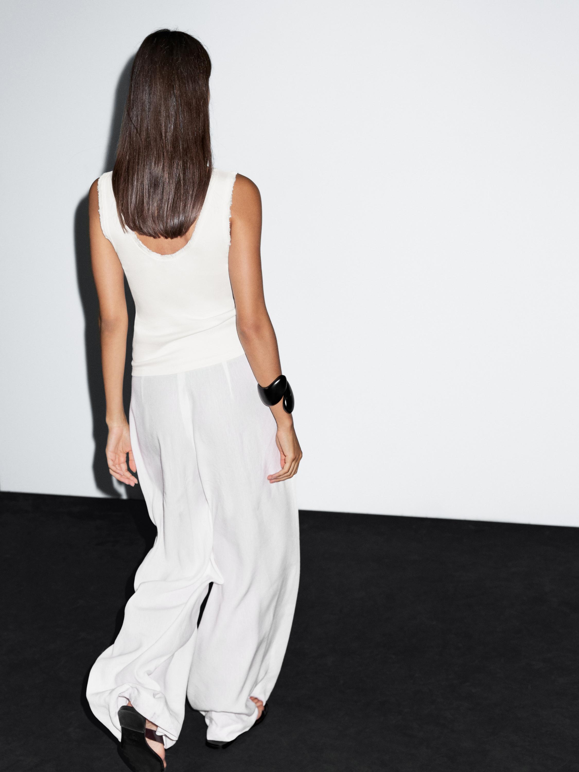 Cotton blend top with frayed piping