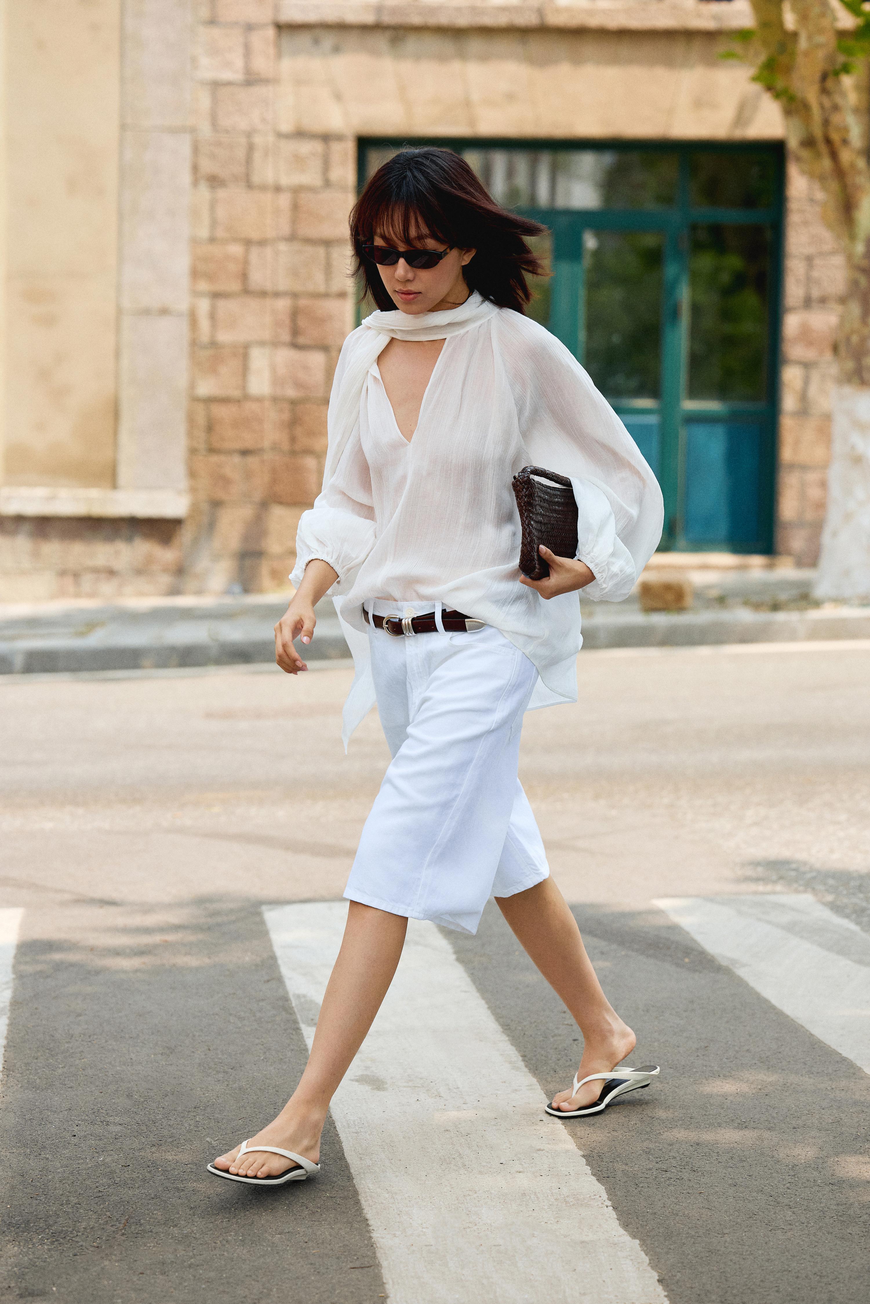 Flowing V-neck blouse with tie — WHITE