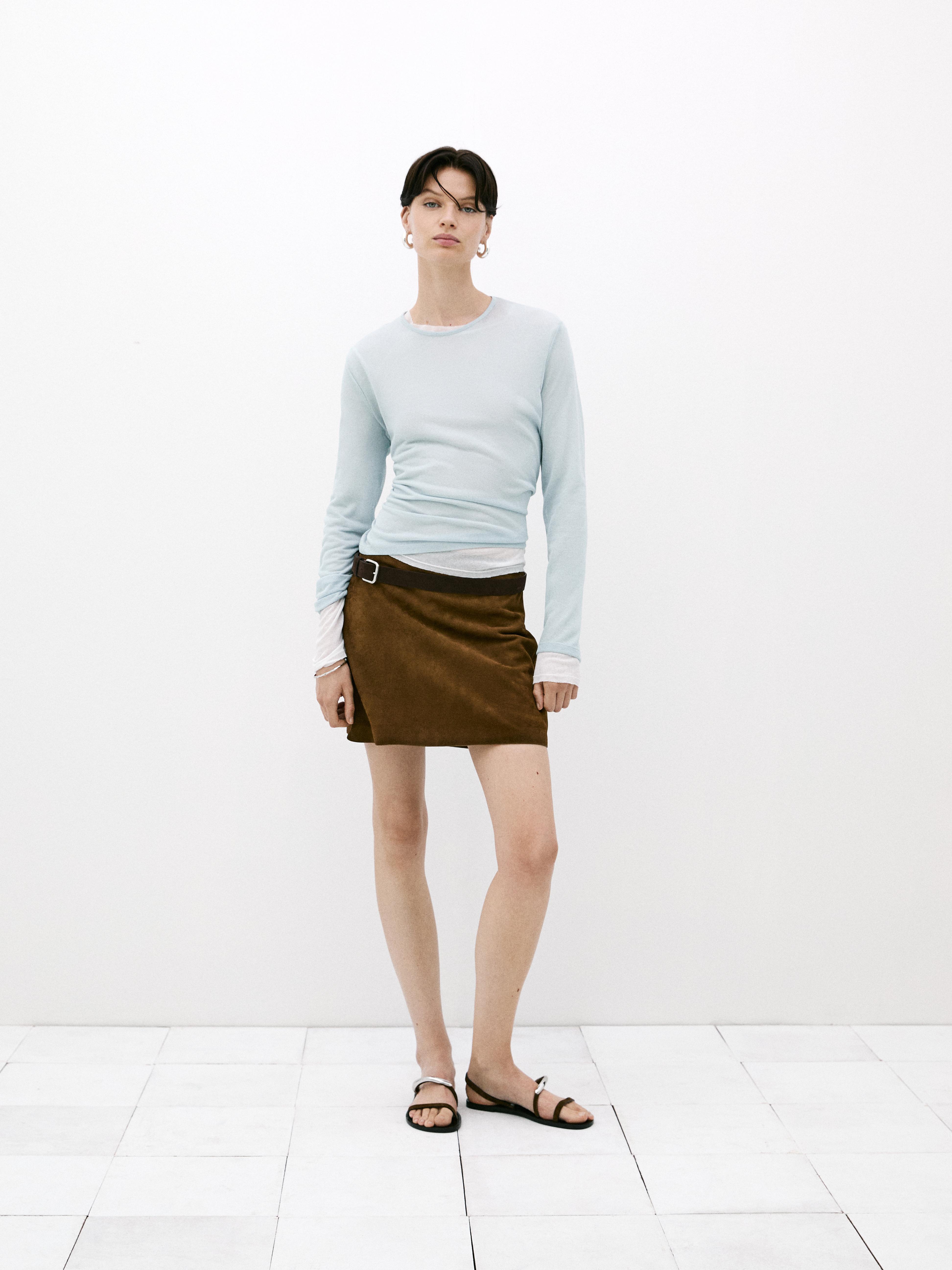 Flat sandals with metallic embellishment