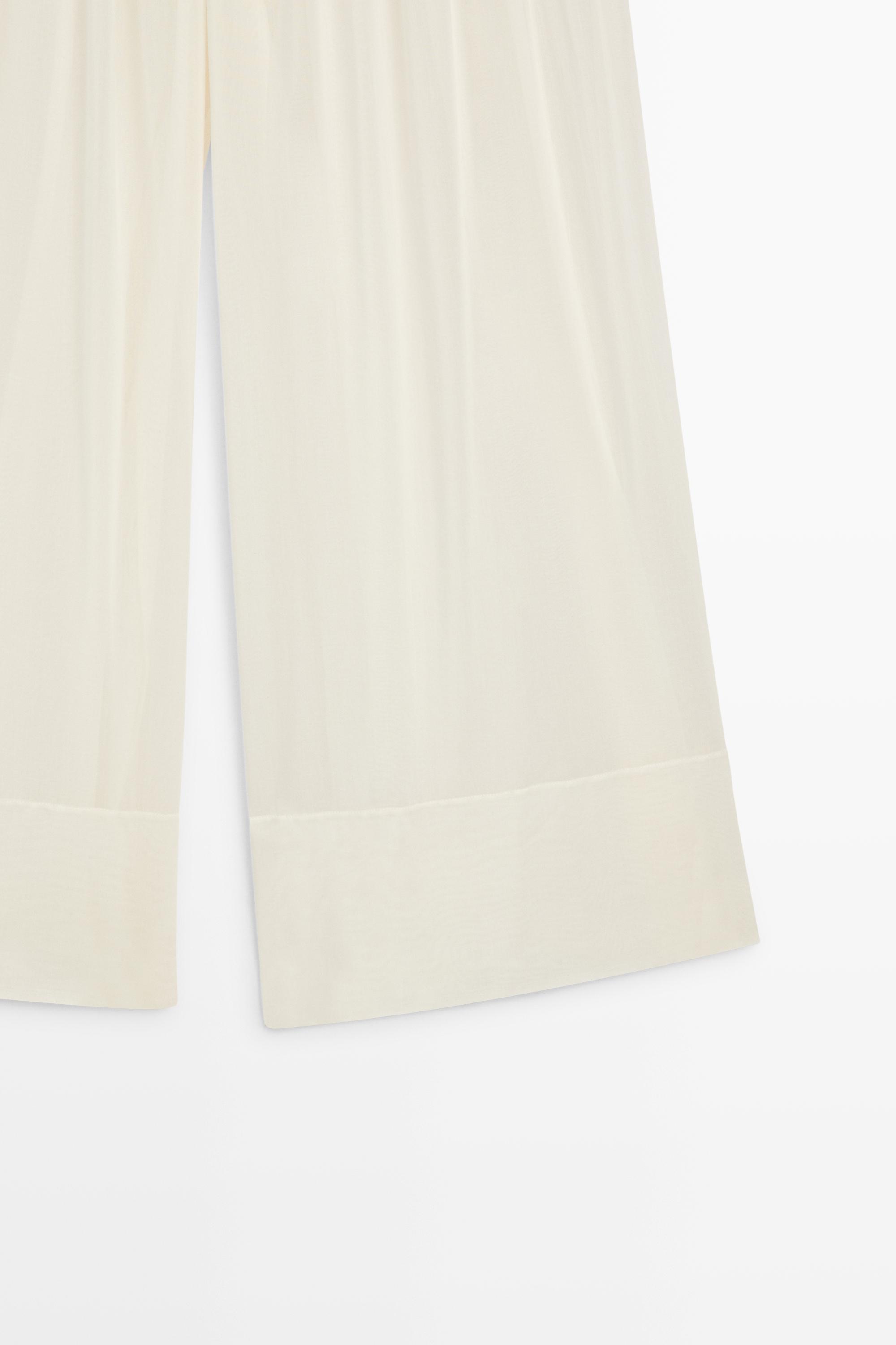 Semi-sheer flowing wide-leg pants — Off white