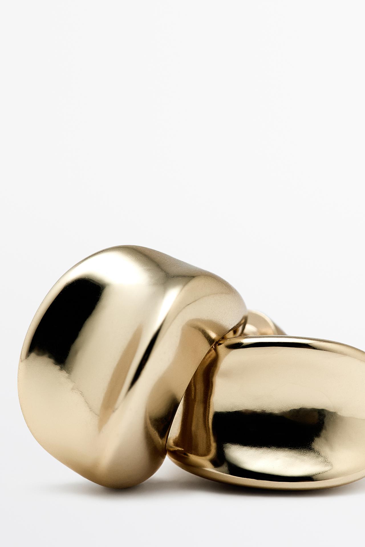 Curved hoop earrings — GOLDEN