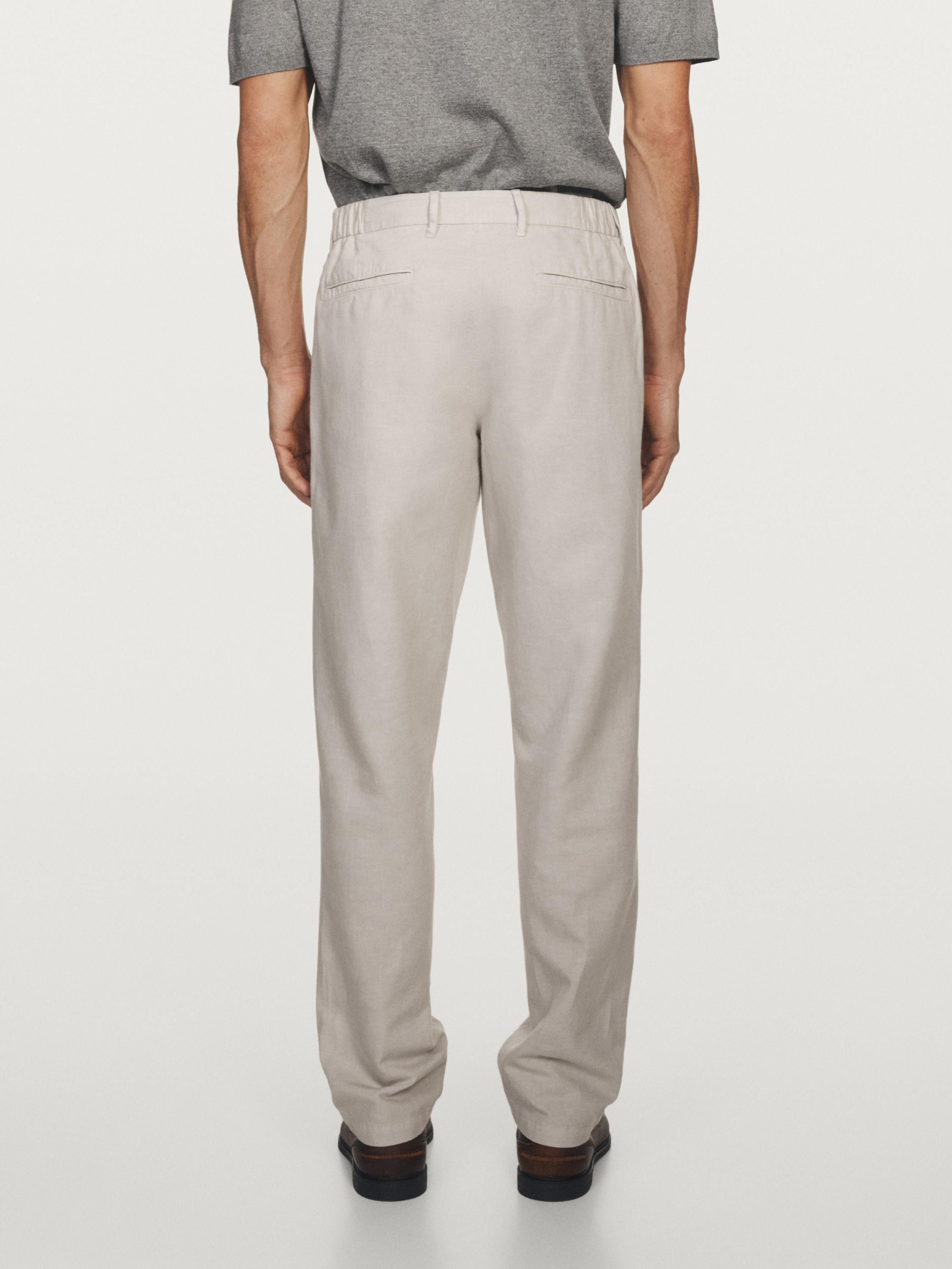 Pantalón tapered fit con lino