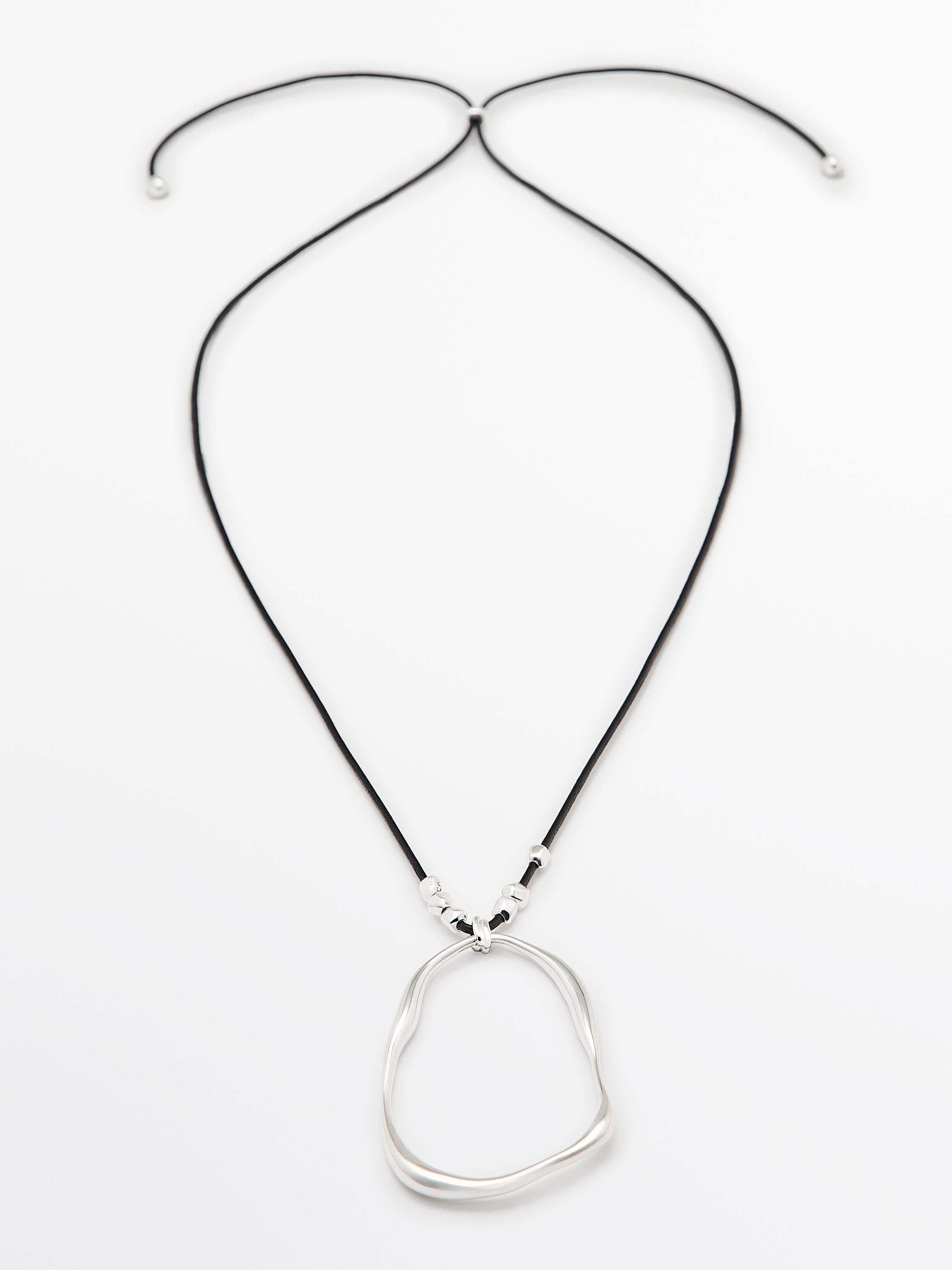 Leather cord necklace with asymmetric piece