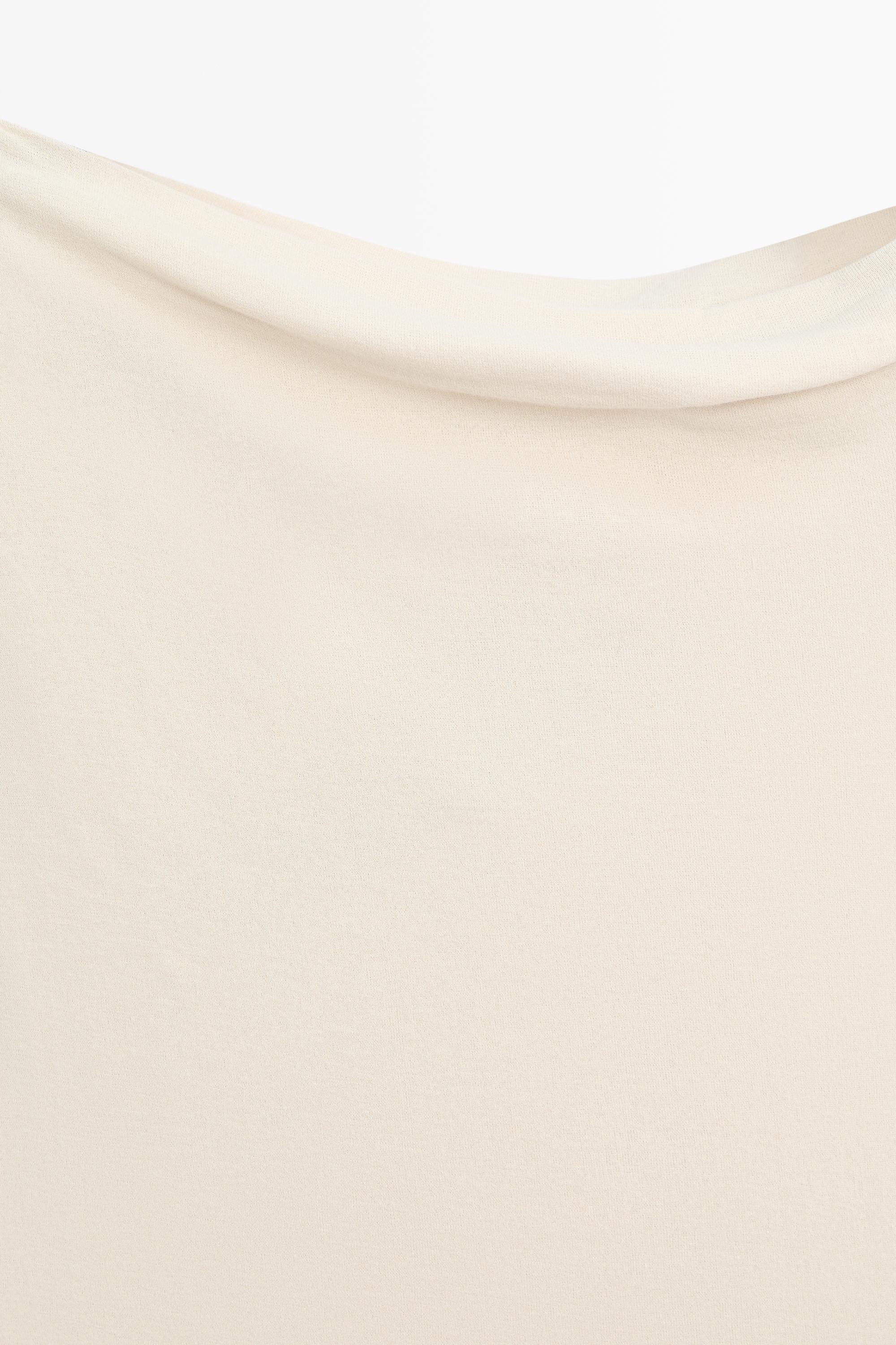 Asymmetric drop sleeve top — SAND