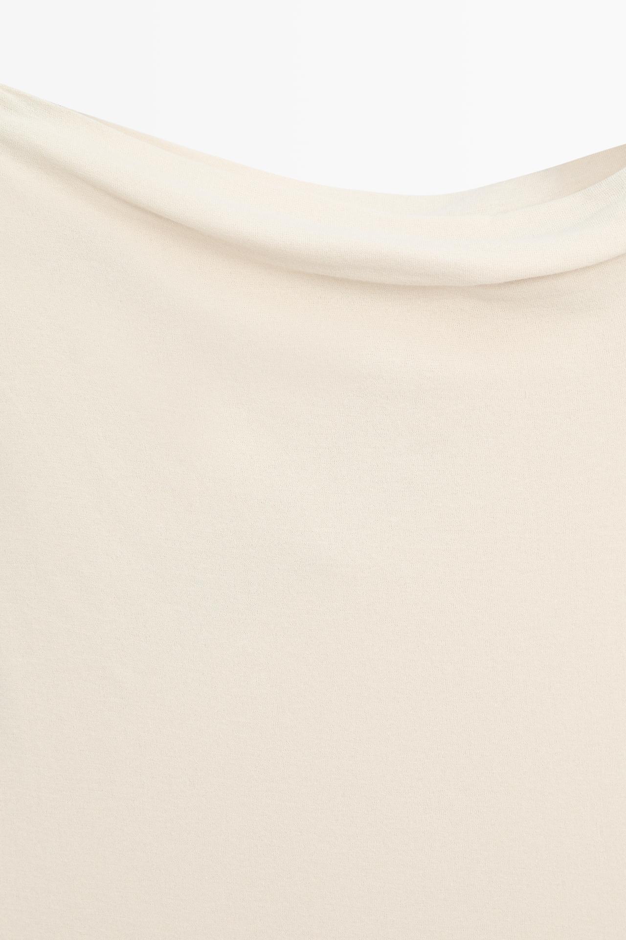 Asymmetric drop sleeve top — SAND