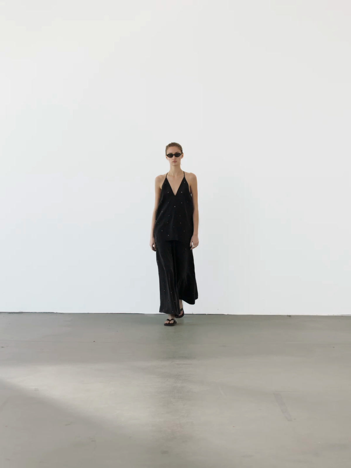 Flowing top with eyelets