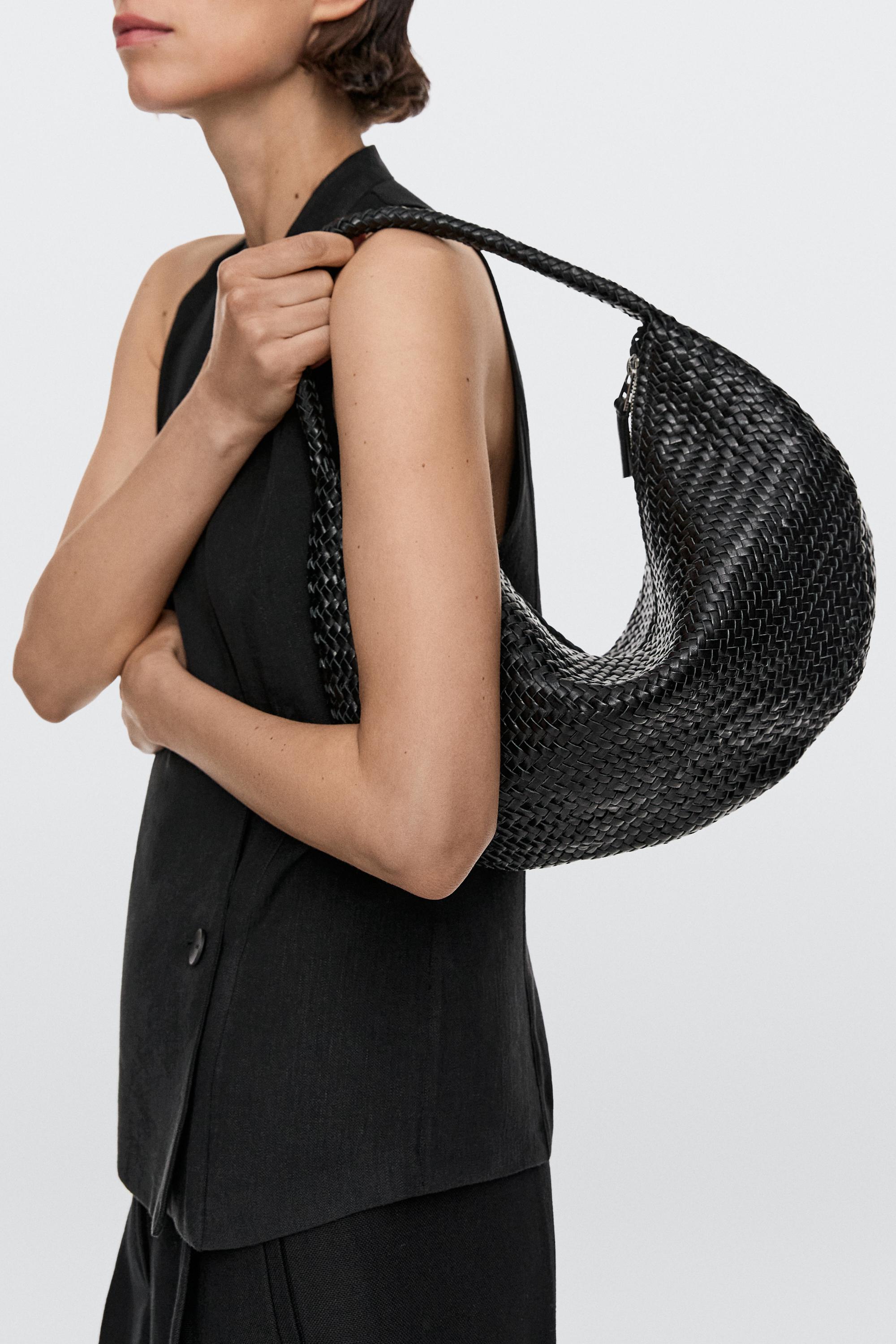 Braided leather half-moon bag — BLACK