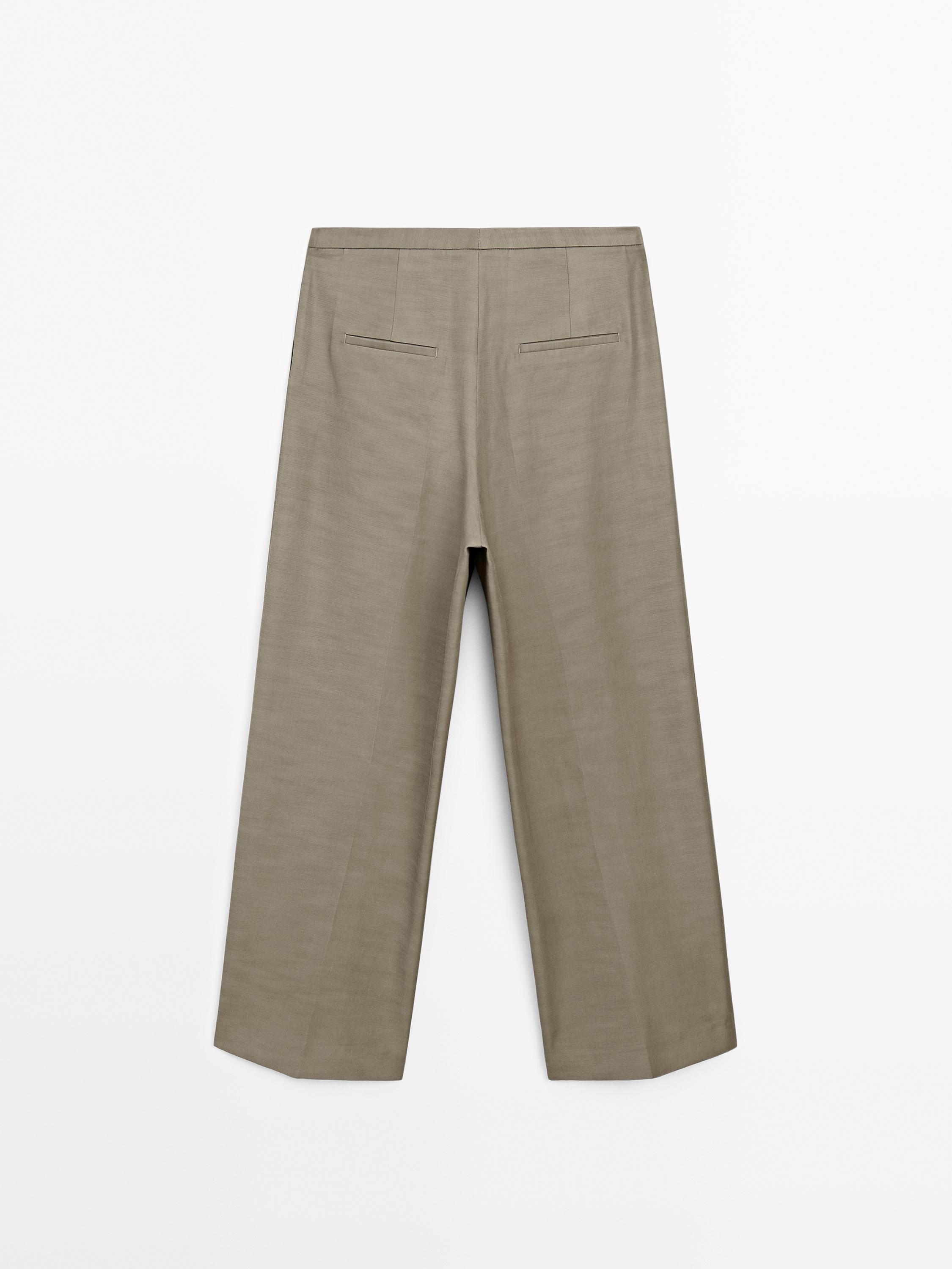 Darted trousers with thin waistband