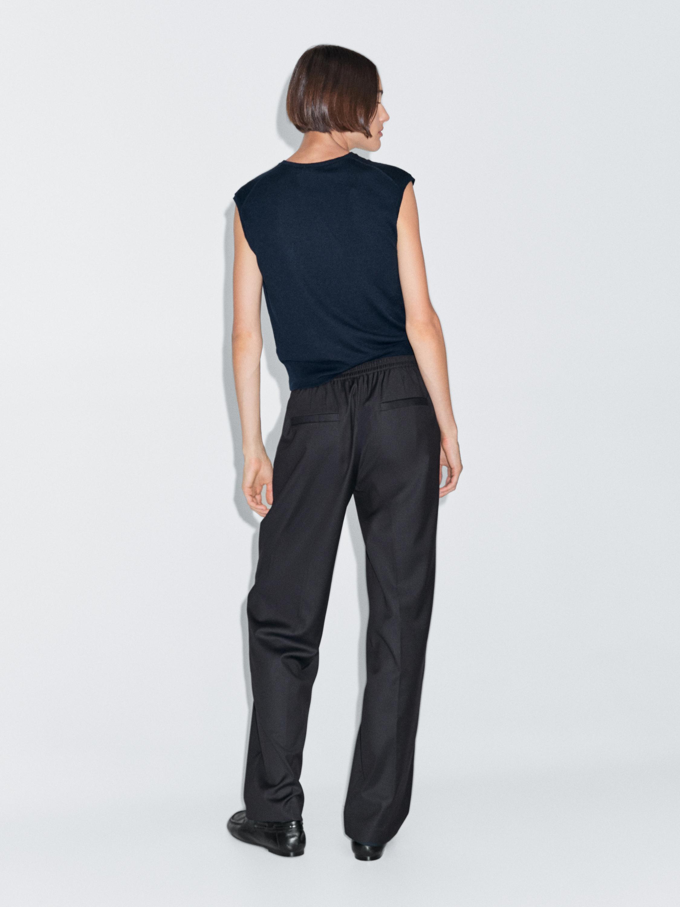 Dart trousers with elastic waistband