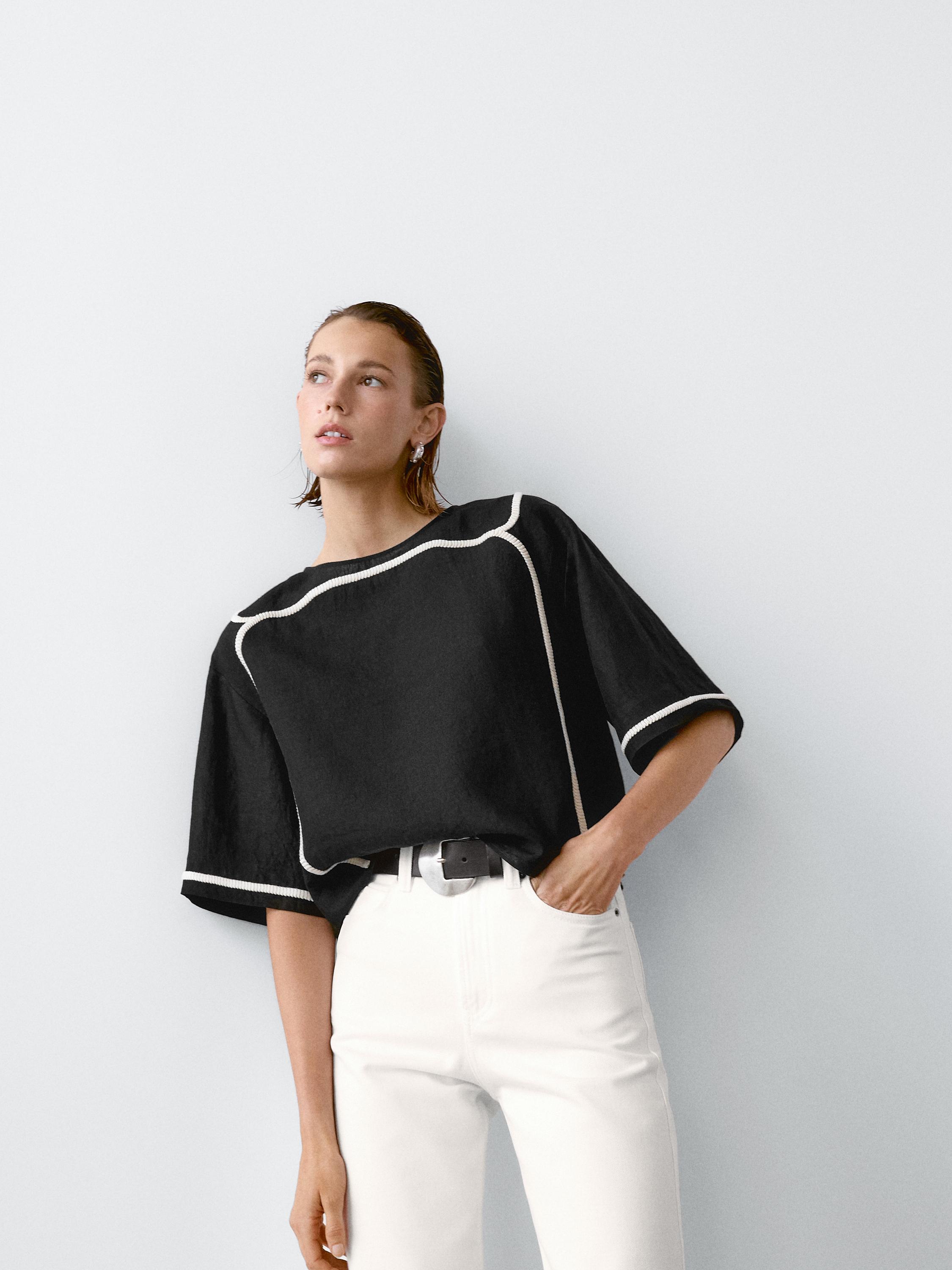 Blouse with contrast embroidery