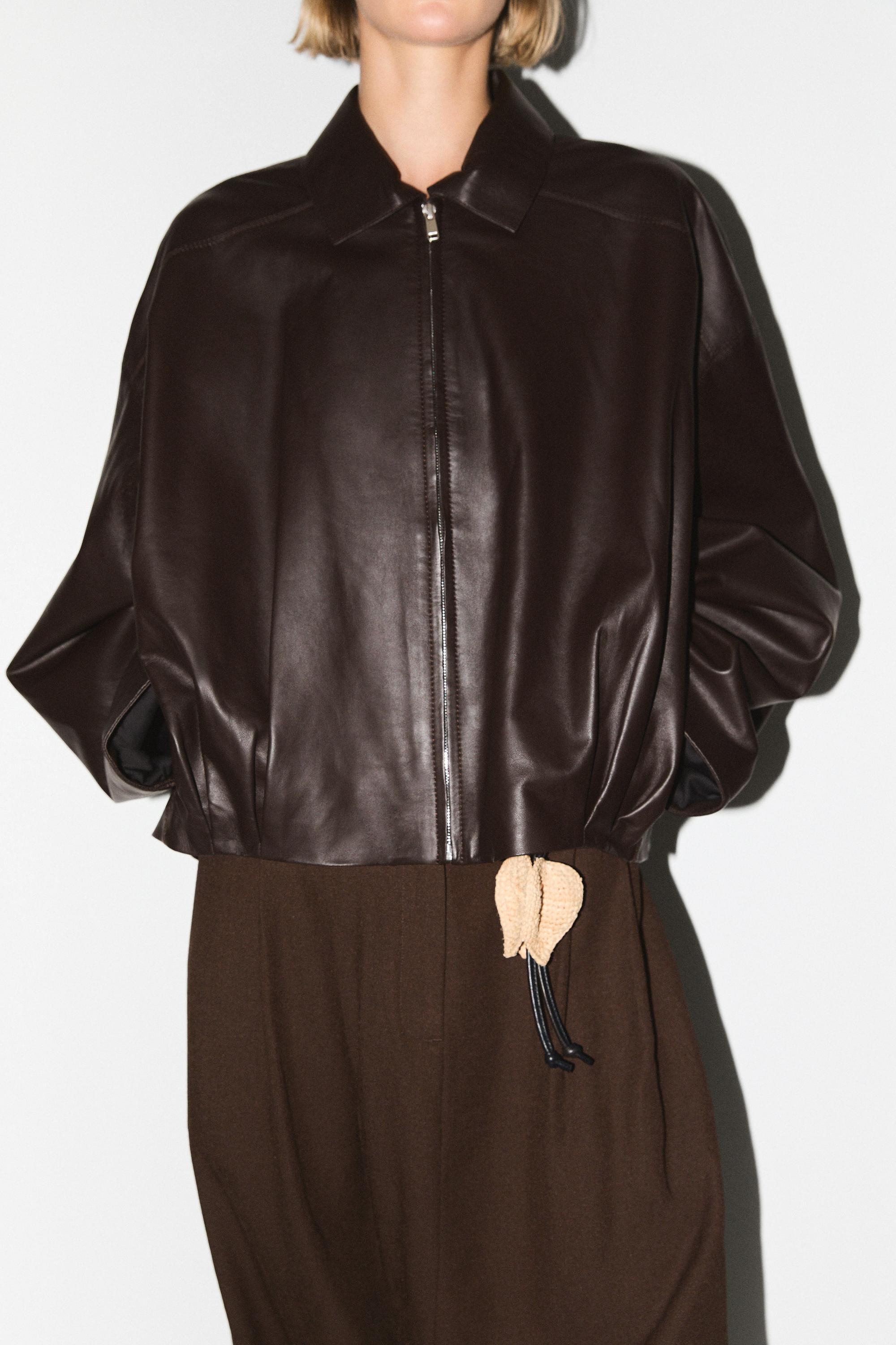 Baggy trousers with pleated details — BROWN