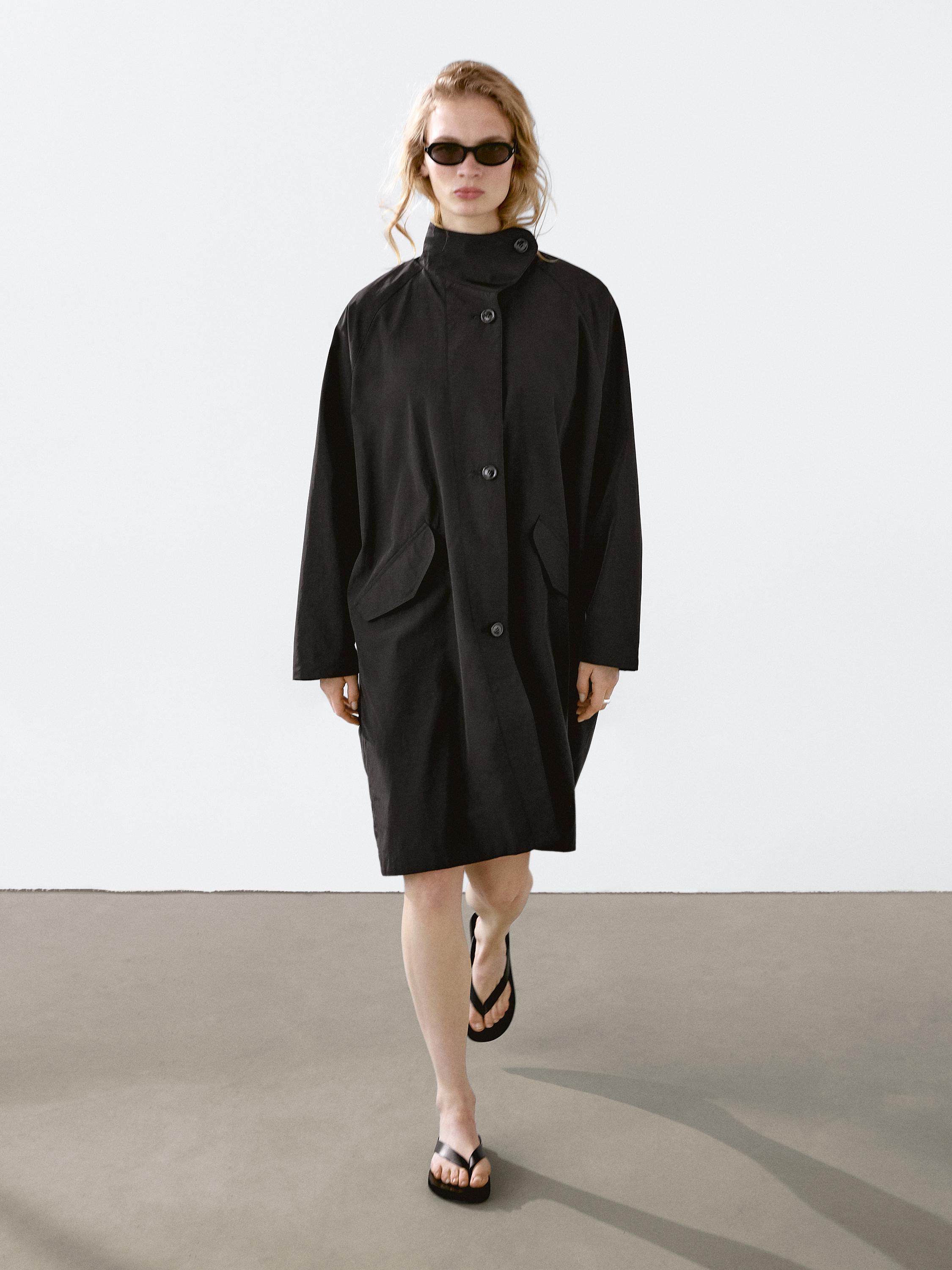 Oversize flowing trench coat in water-repellent fabric