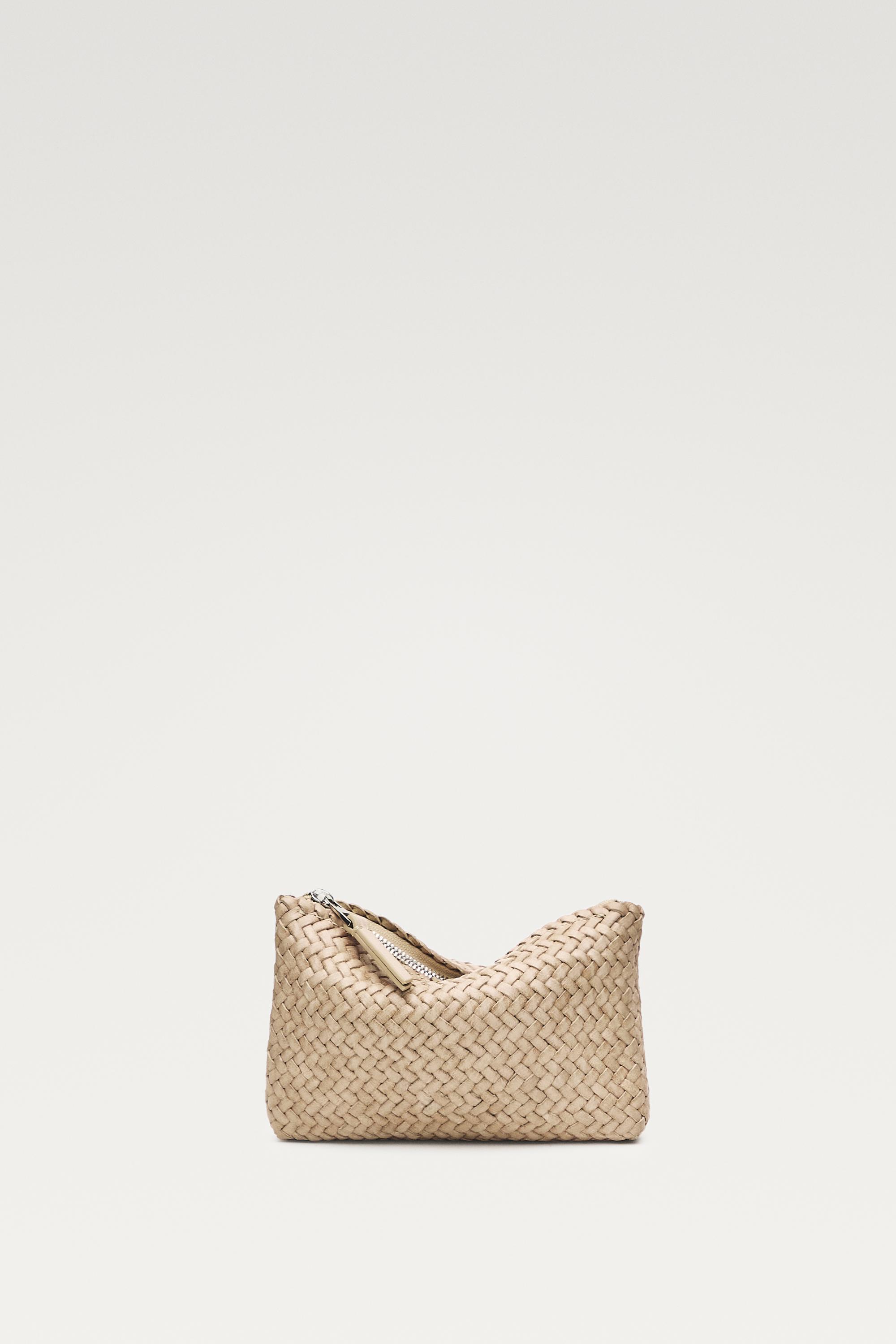 Braided nappa leather pouch bag — CREAM