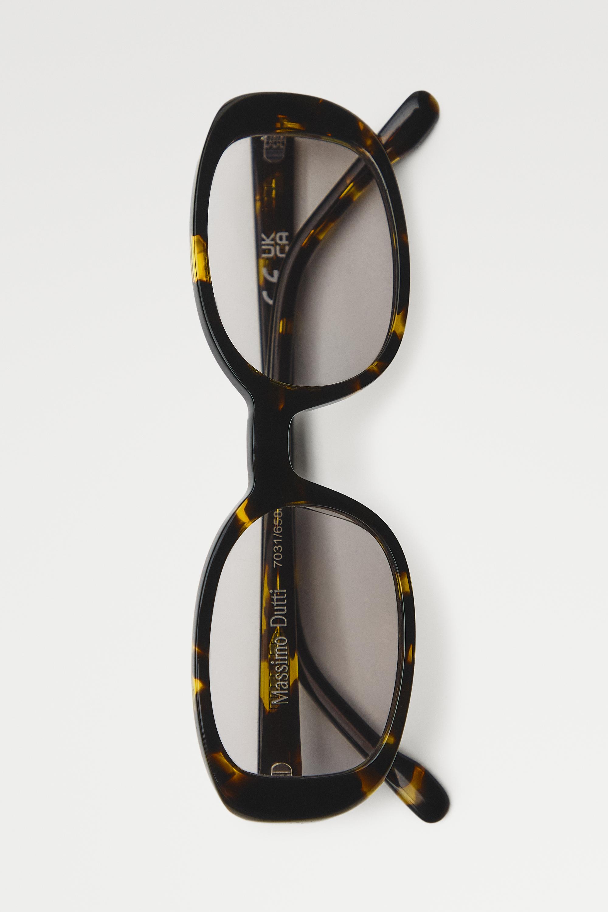 Oval tortoiseshell-effect sunglasses — BROWN