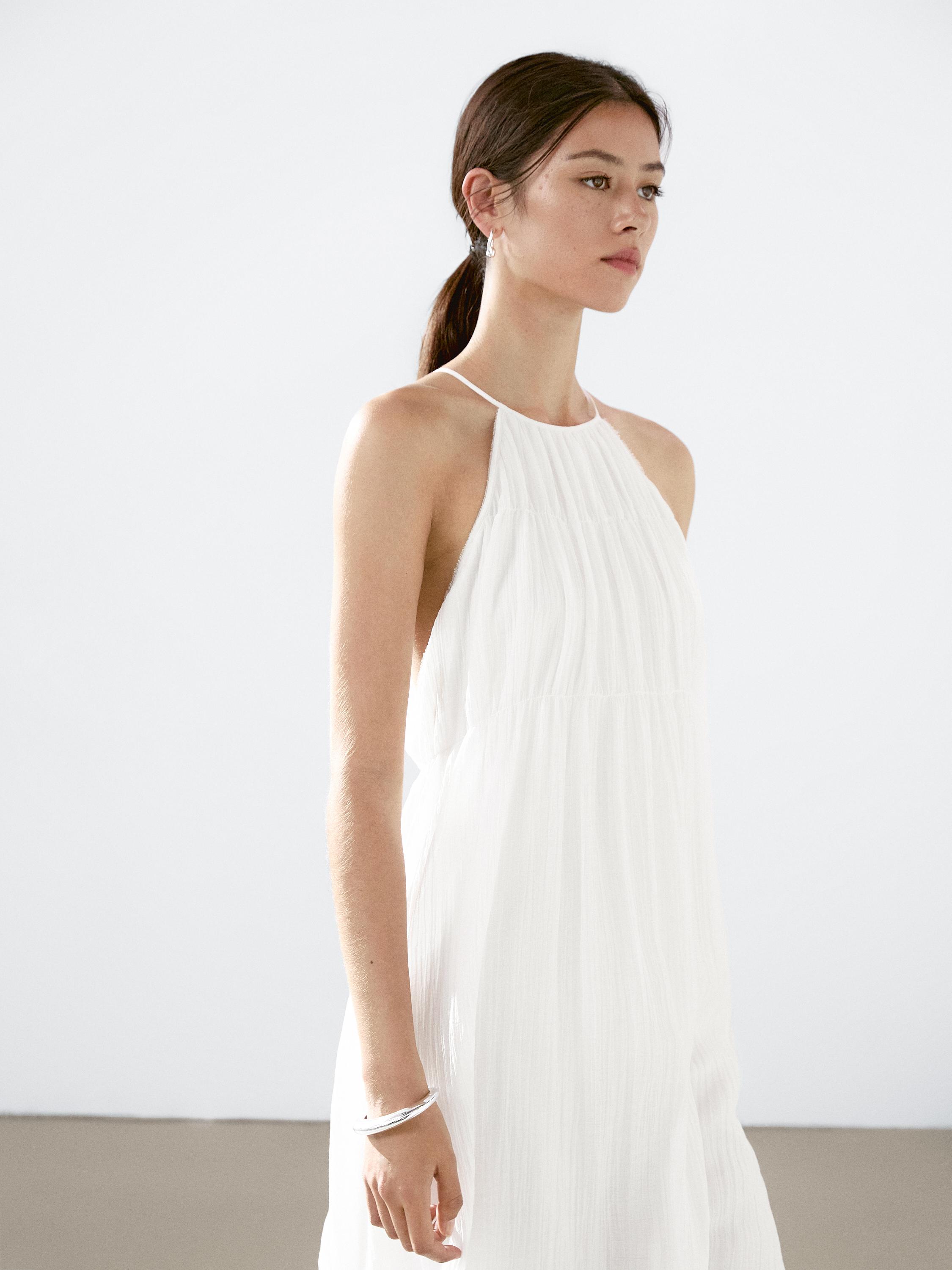 Long pleated dress with gathered detail